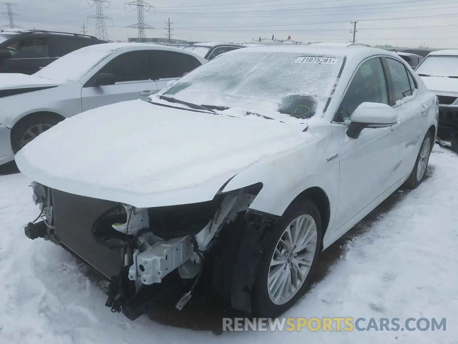 2 Photograph of a damaged car 4T1B21HK1KU513652 TOYOTA CAMRY 2019