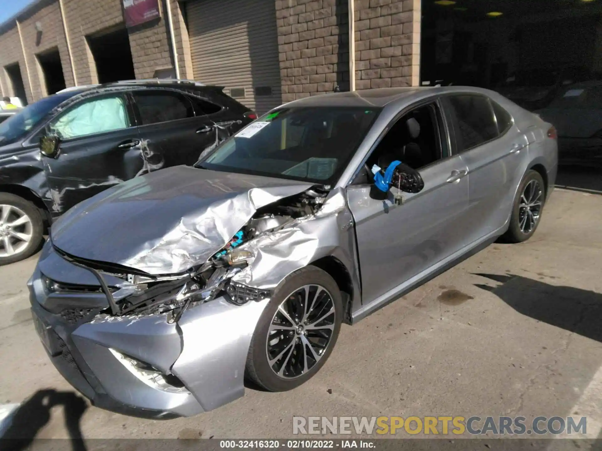 2 Photograph of a damaged car 4T1B21HK1KU521511 TOYOTA CAMRY 2019