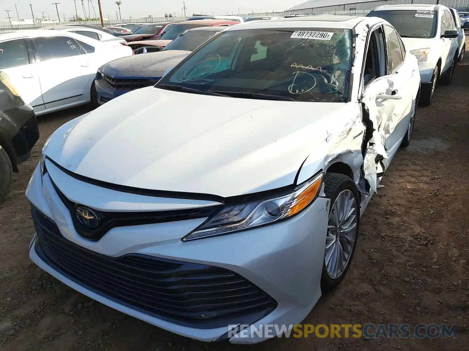 2 Photograph of a damaged car 4T1B21HK2KU014343 TOYOTA CAMRY 2019