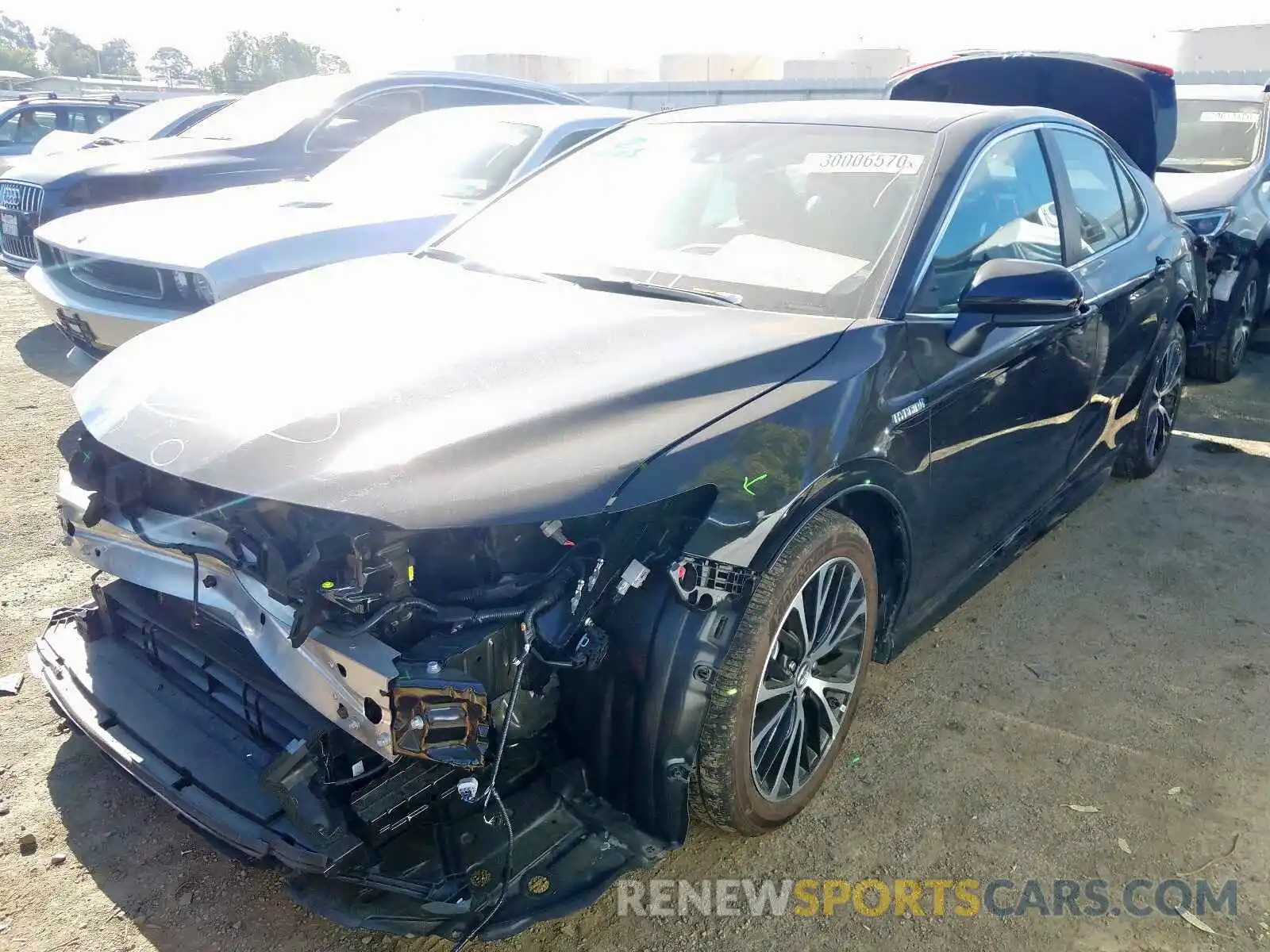 2 Photograph of a damaged car 4T1B21HK2KU518696 TOYOTA CAMRY 2019