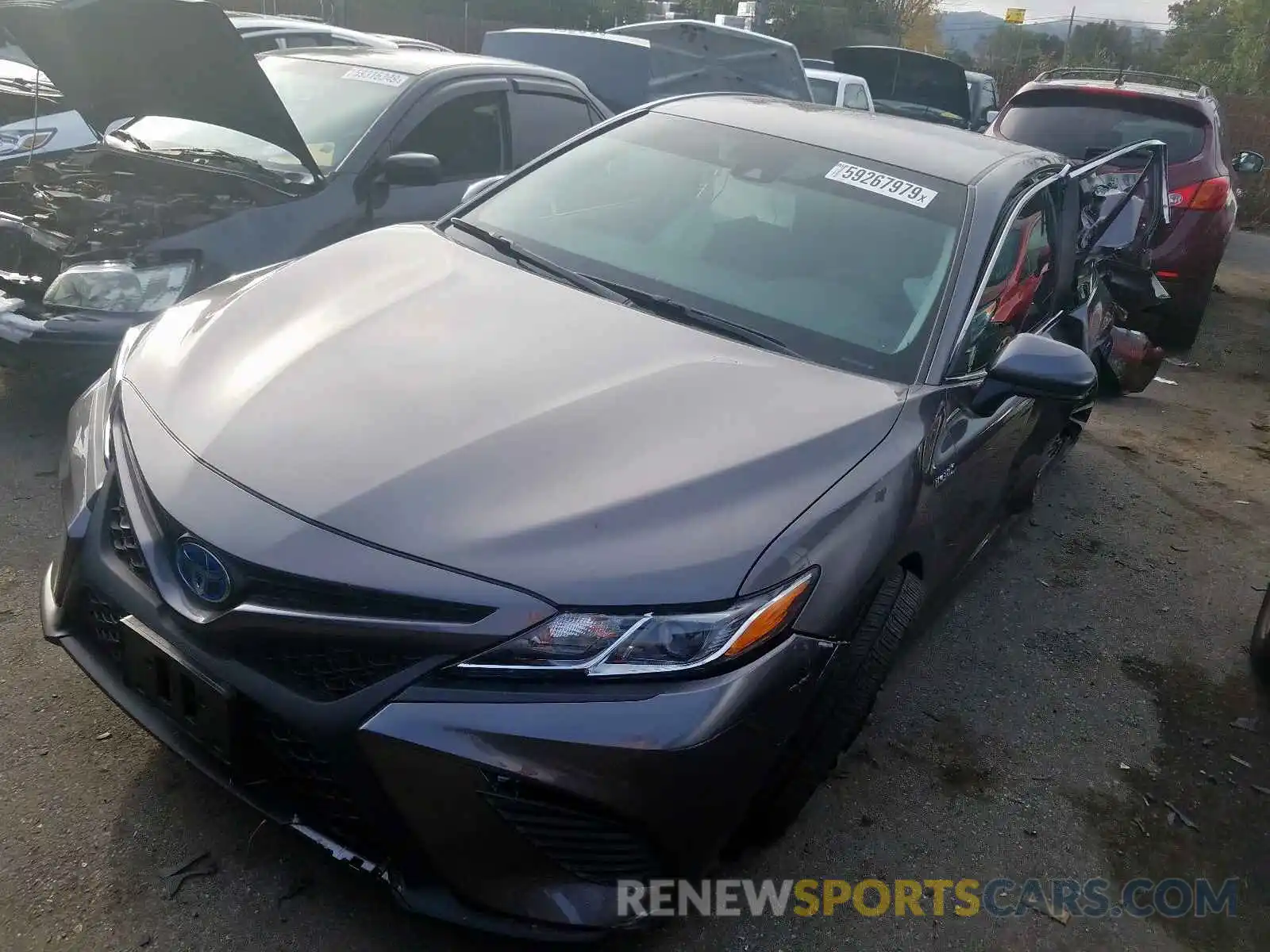 2 Photograph of a damaged car 4T1B21HK2KU519024 TOYOTA CAMRY 2019