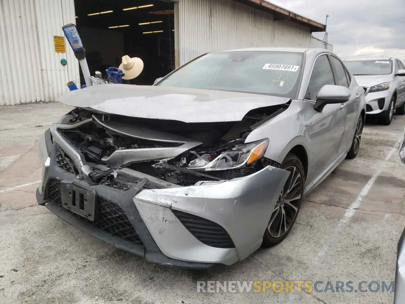 2 Photograph of a damaged car 4T1B21HK3KU012097 TOYOTA CAMRY 2019