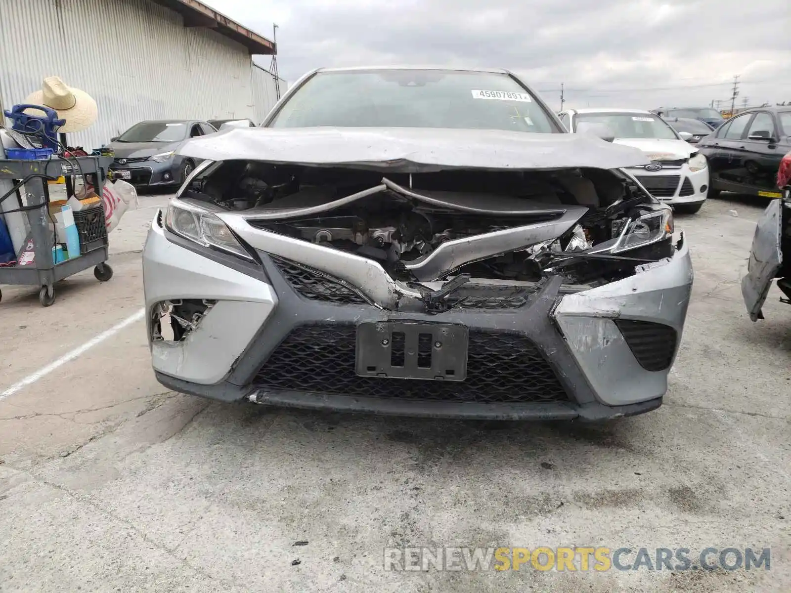 9 Photograph of a damaged car 4T1B21HK3KU012097 TOYOTA CAMRY 2019