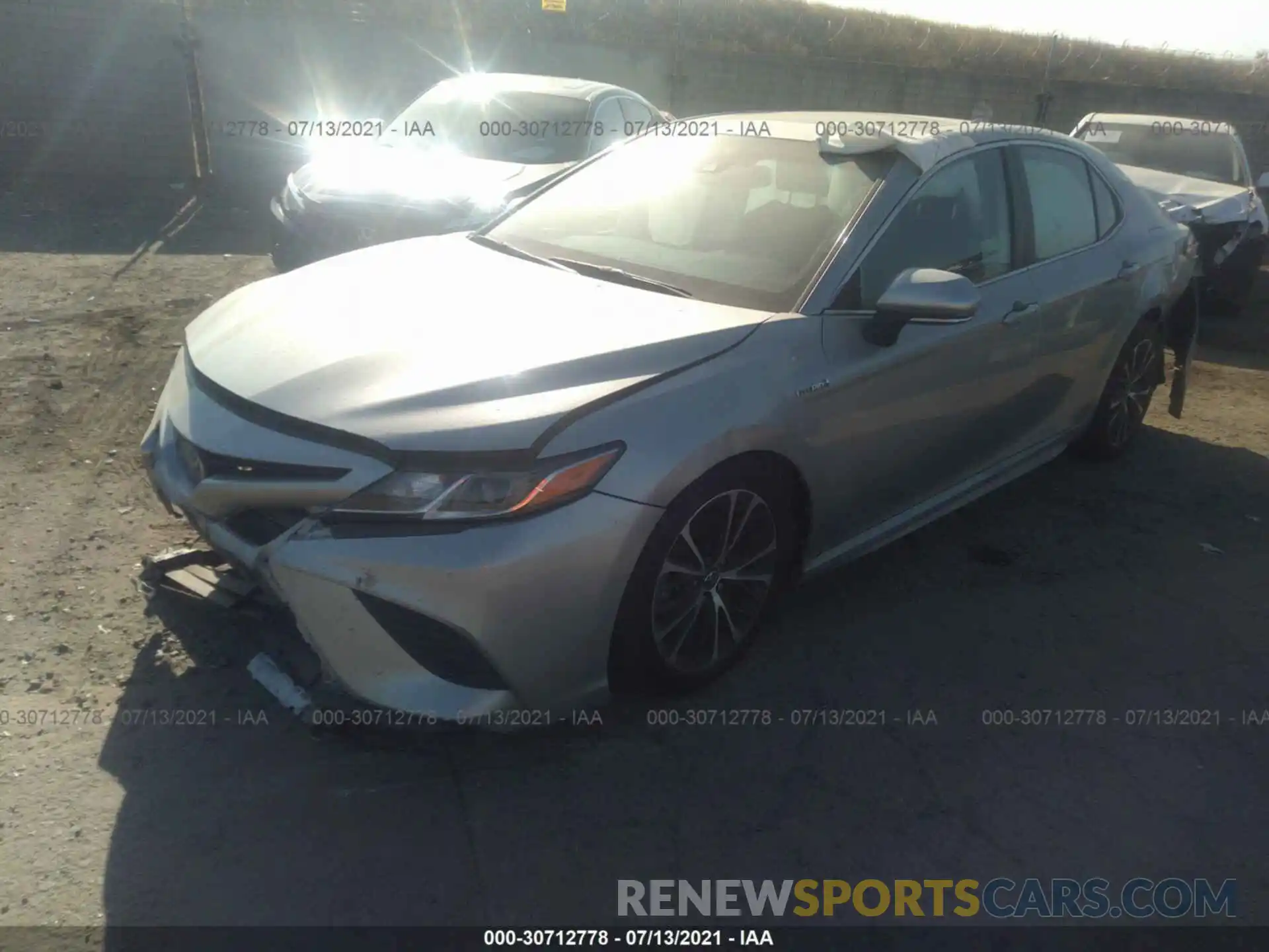 2 Photograph of a damaged car 4T1B21HK4KU011296 TOYOTA CAMRY 2019