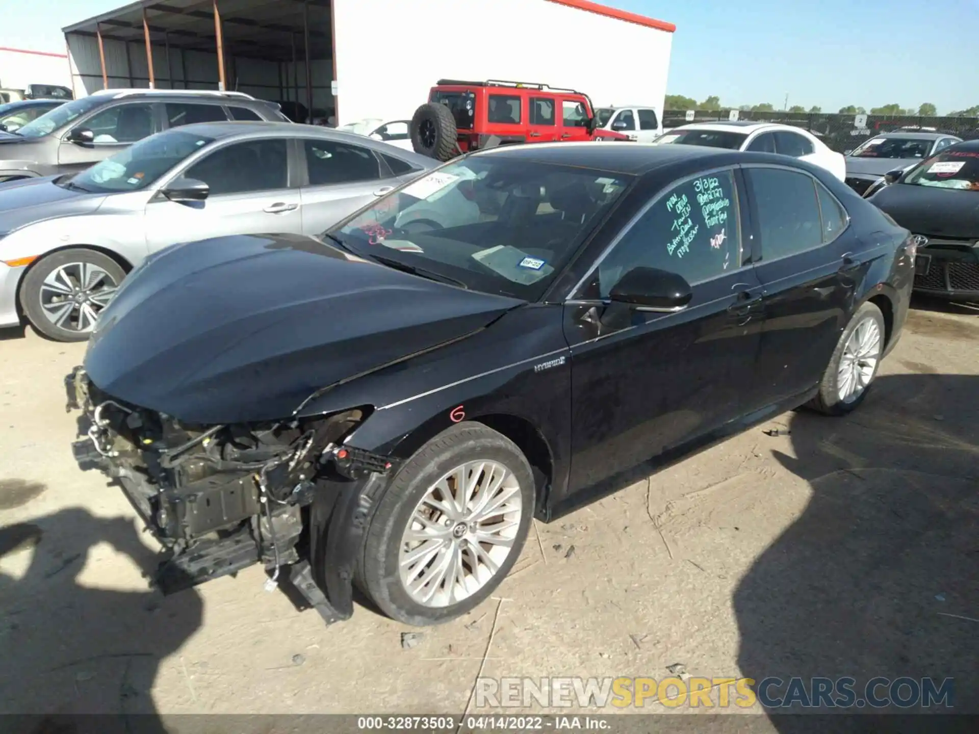 2 Photograph of a damaged car 4T1B21HK4KU521857 TOYOTA CAMRY 2019