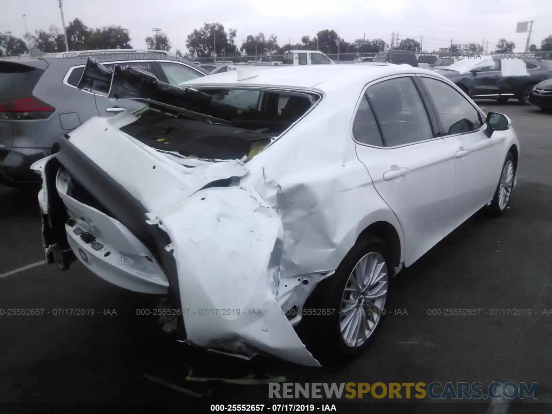 4 Photograph of a damaged car 4T1B21HK5KU512357 TOYOTA CAMRY 2019