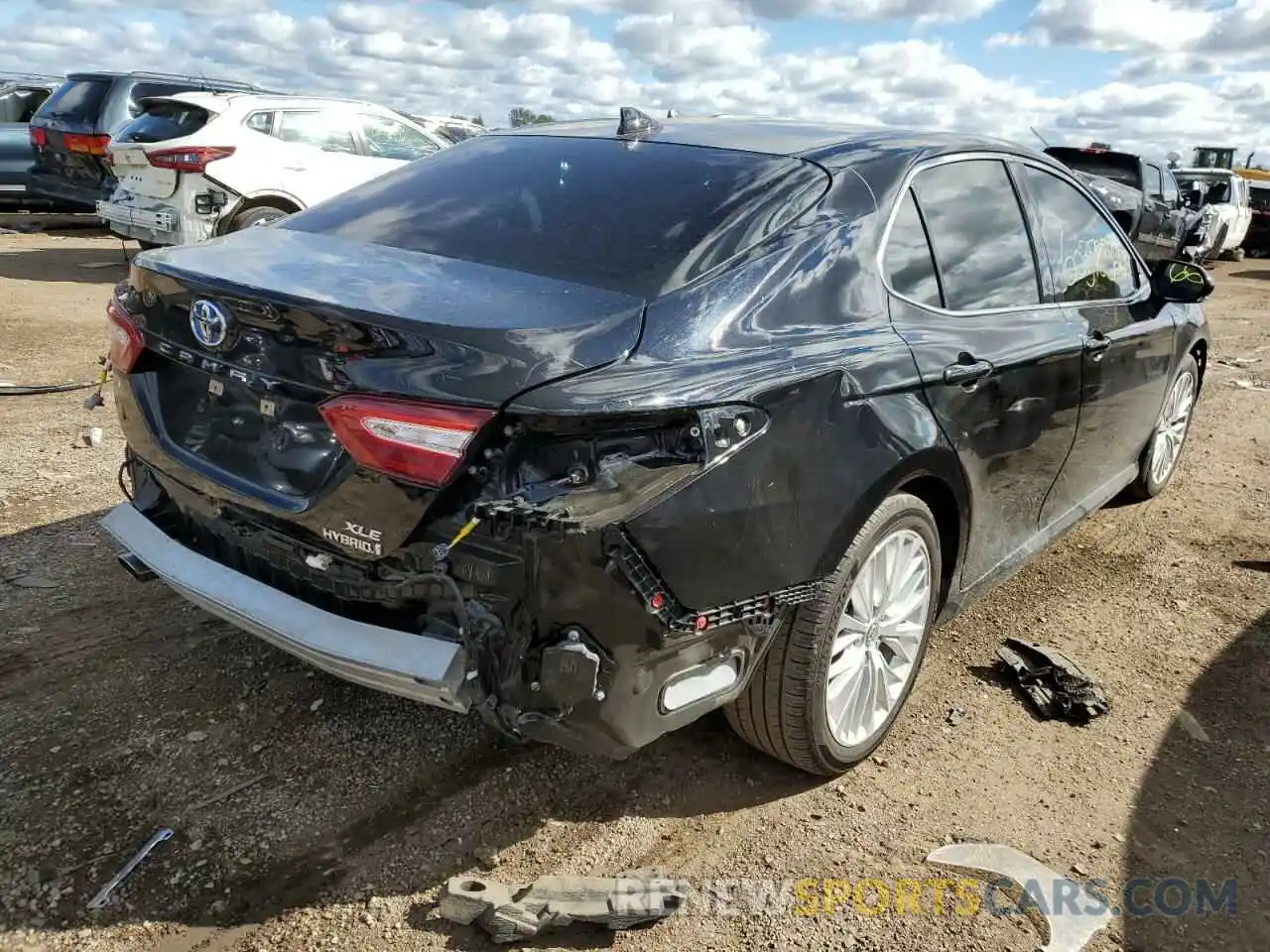 4 Photograph of a damaged car 4T1B21HK5KU515159 TOYOTA CAMRY 2019