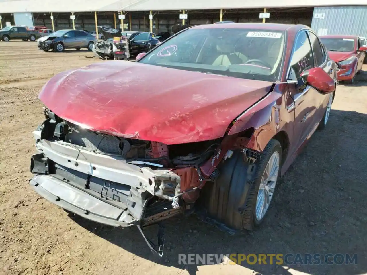 2 Photograph of a damaged car 4T1B21HK6KU512772 TOYOTA CAMRY 2019