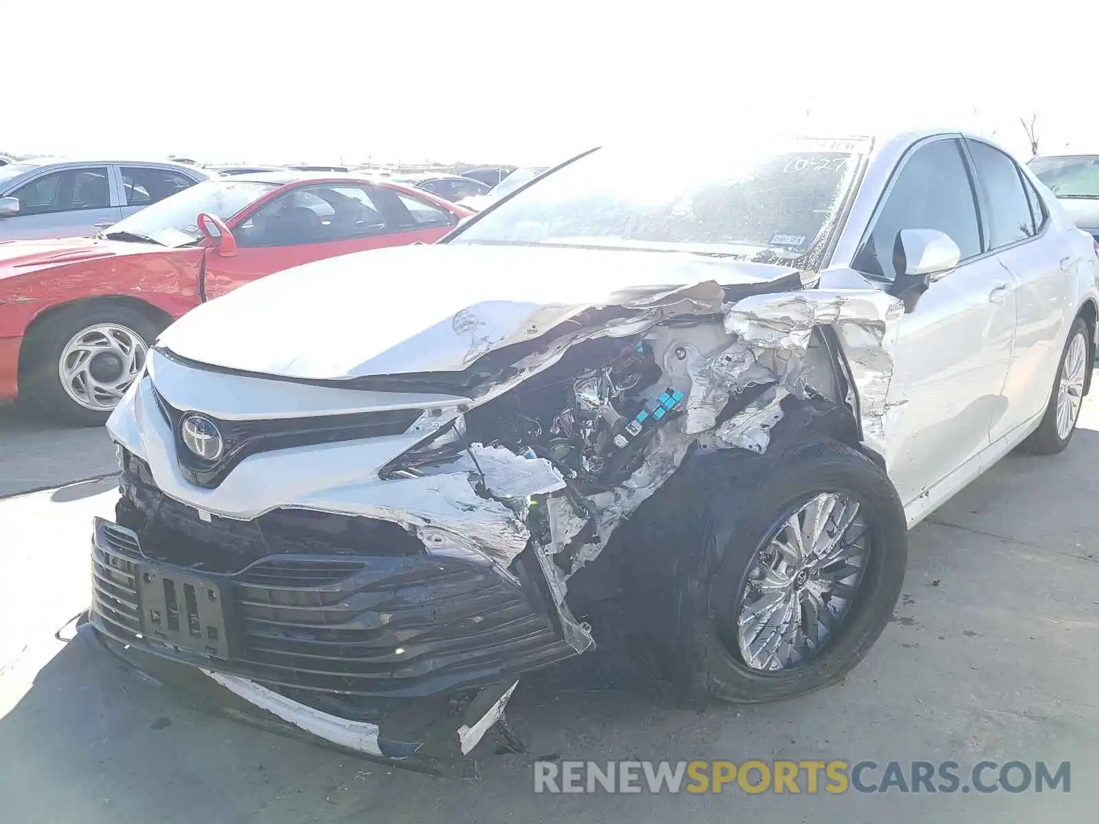 9 Photograph of a damaged car 4T1B21HK7KU520332 TOYOTA CAMRY 2019