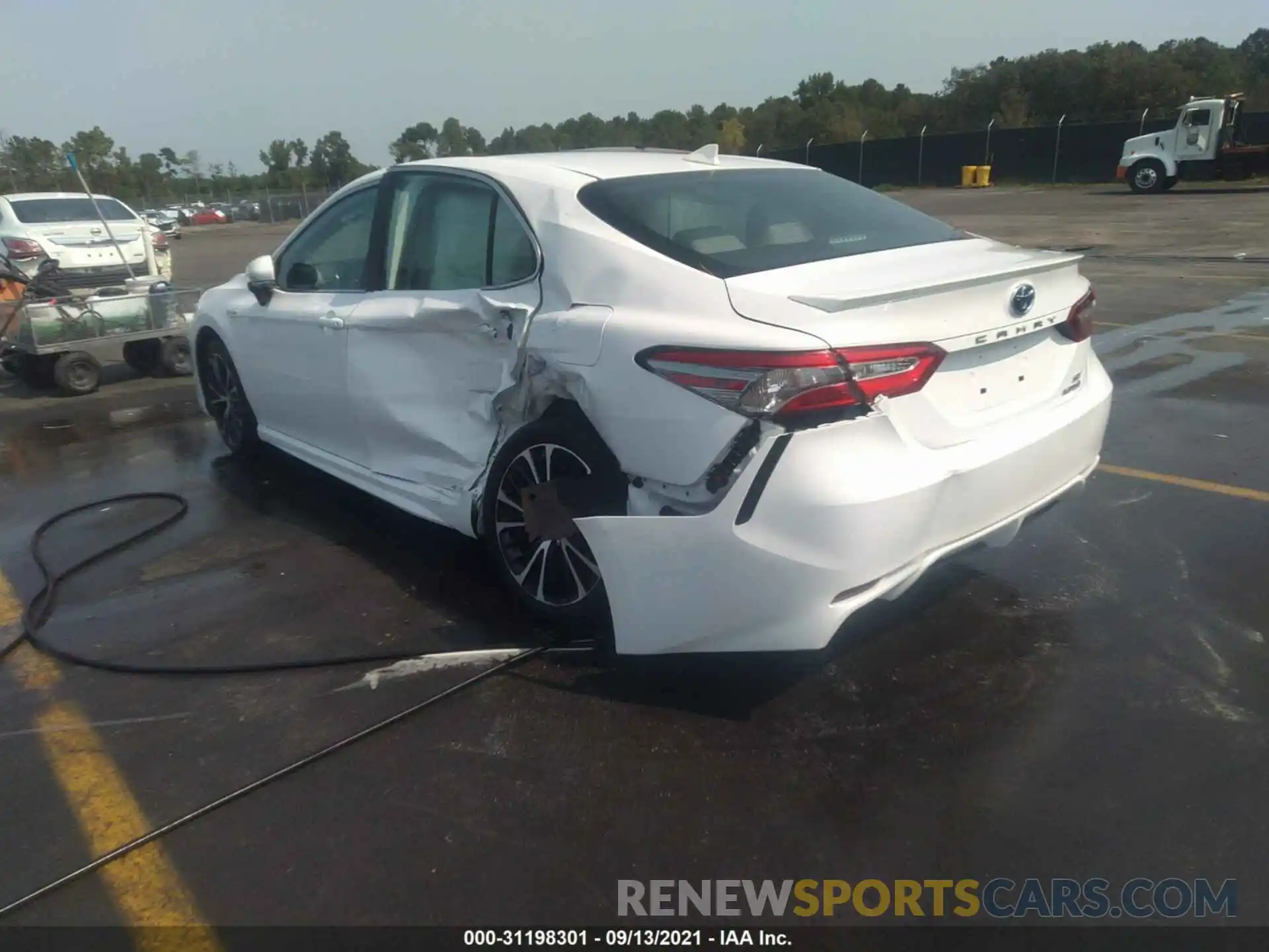 3 Photograph of a damaged car 4T1B21HK8KU014038 TOYOTA CAMRY 2019