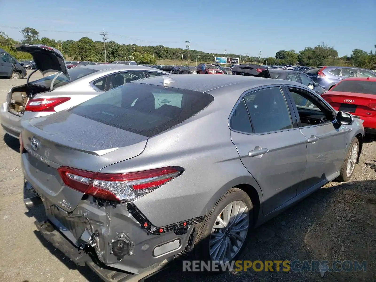 4 Photograph of a damaged car 4T1B21HK8KU519612 TOYOTA CAMRY 2019