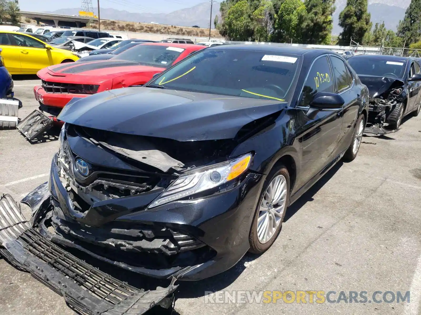 2 Photograph of a damaged car 4T1B21HK9KU514001 TOYOTA CAMRY 2019