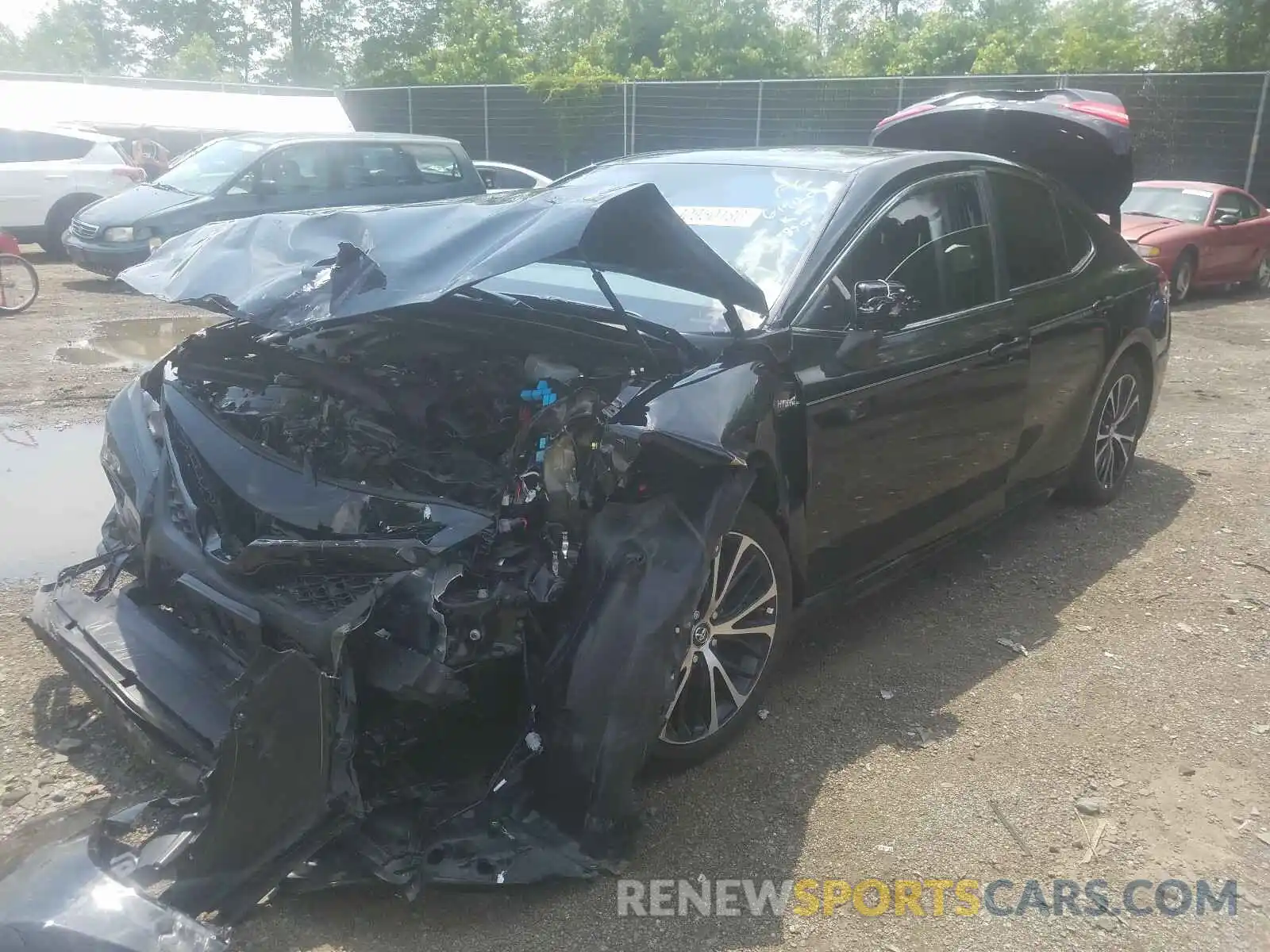 2 Photograph of a damaged car 4T1B21HK9KU521997 TOYOTA CAMRY 2019