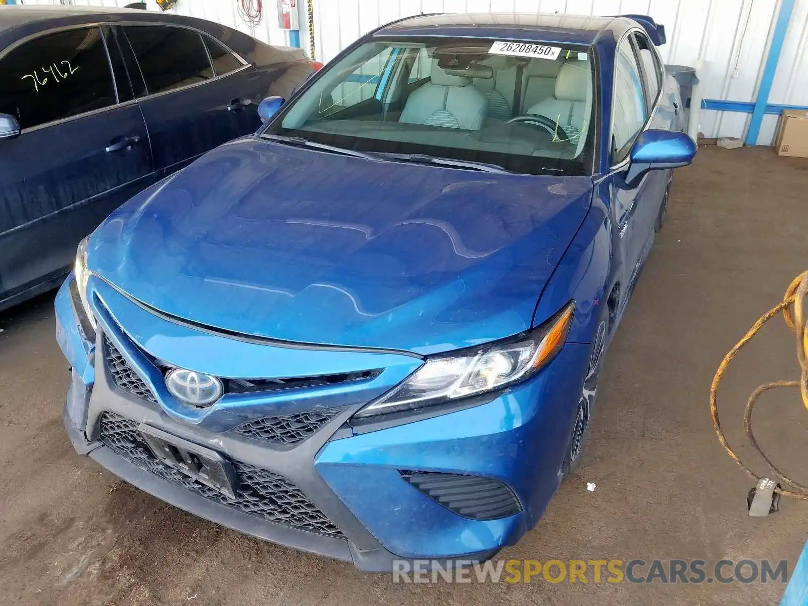 2 Photograph of a damaged car 4T1B21HKXKU011786 TOYOTA CAMRY 2019