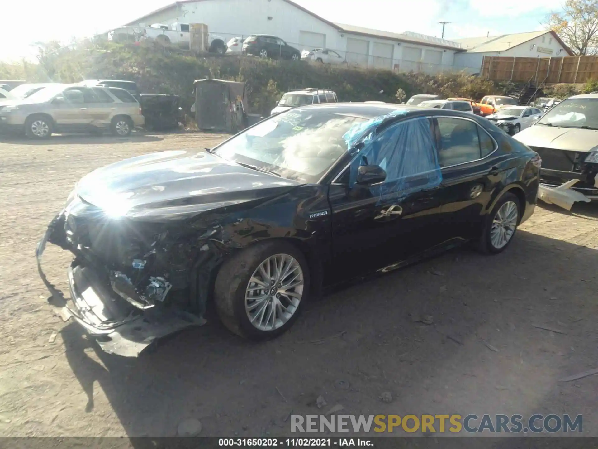 2 Photograph of a damaged car 4T1B21HKXKU012758 TOYOTA CAMRY 2019