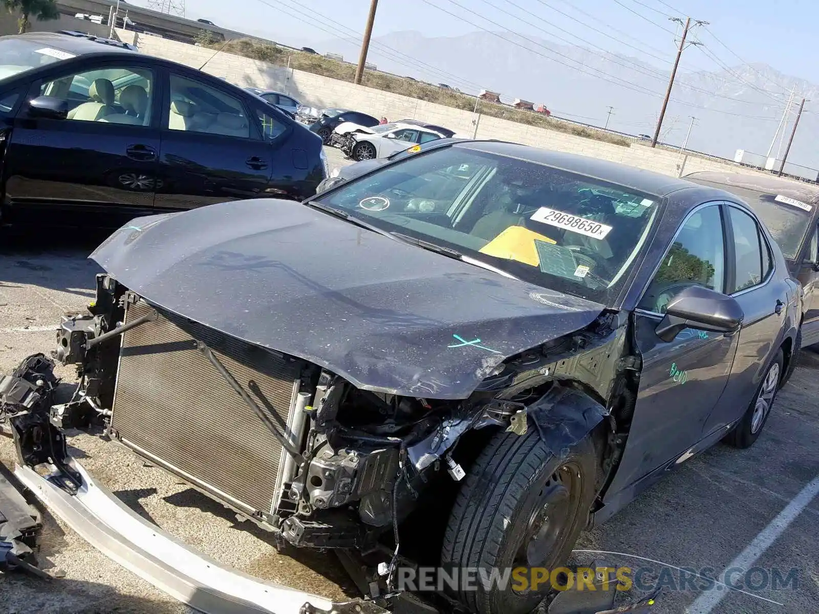 2 Photograph of a damaged car 4T1B31HK0KU510464 TOYOTA CAMRY 2019