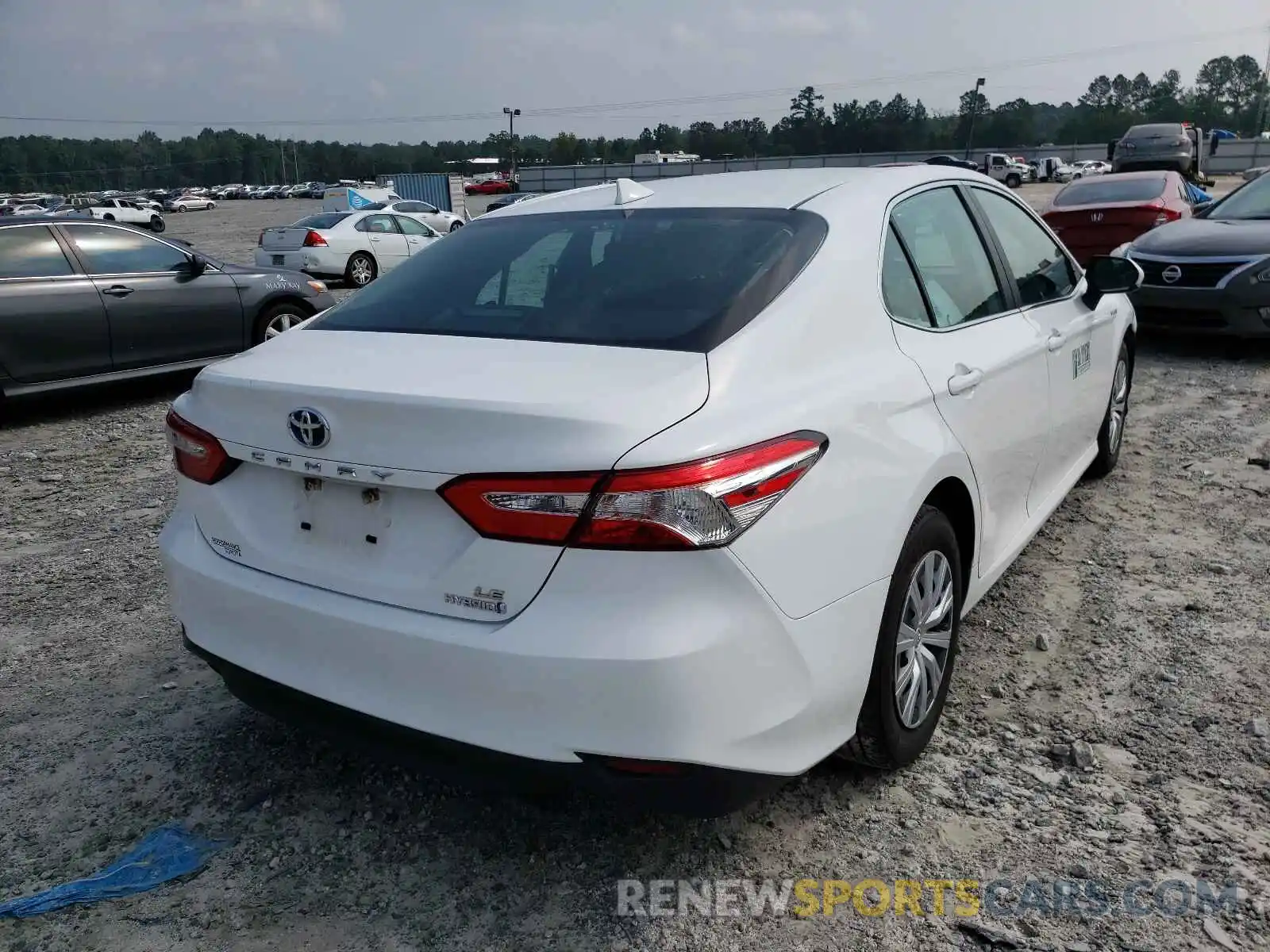 4 Photograph of a damaged car 4T1B31HK0KU510853 TOYOTA CAMRY 2019