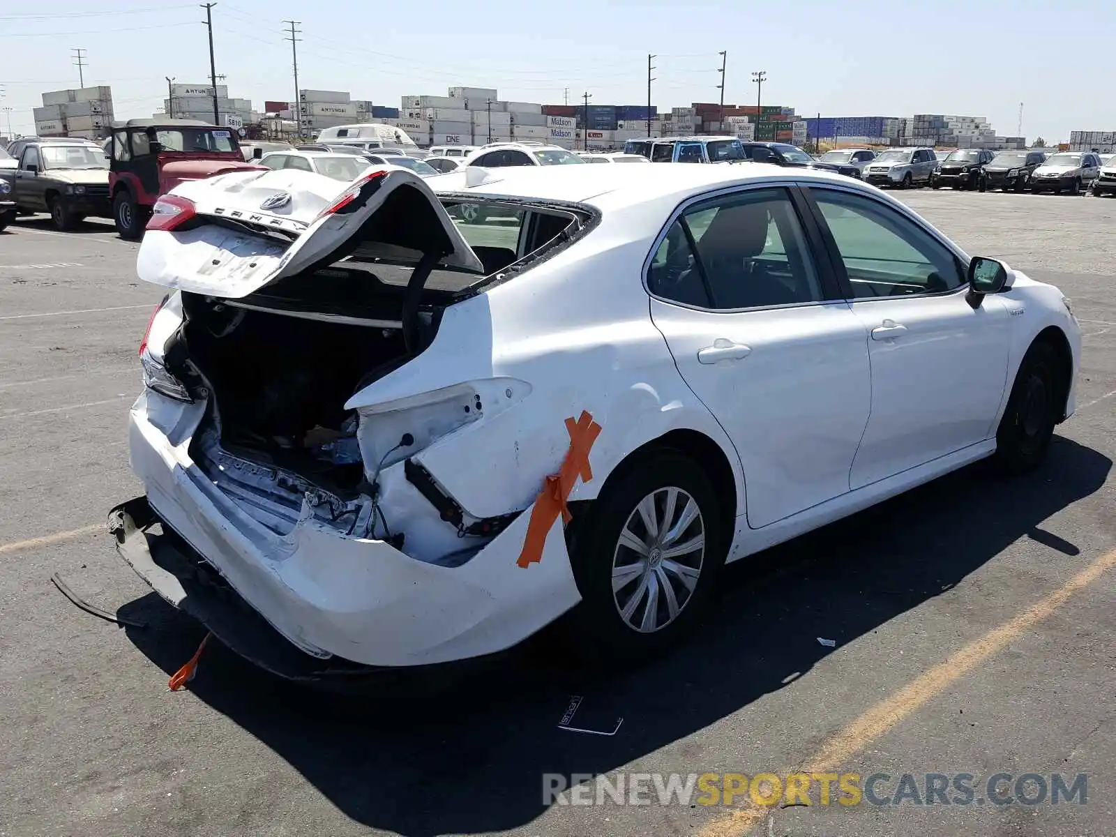 4 Photograph of a damaged car 4T1B31HK0KU512599 TOYOTA CAMRY 2019