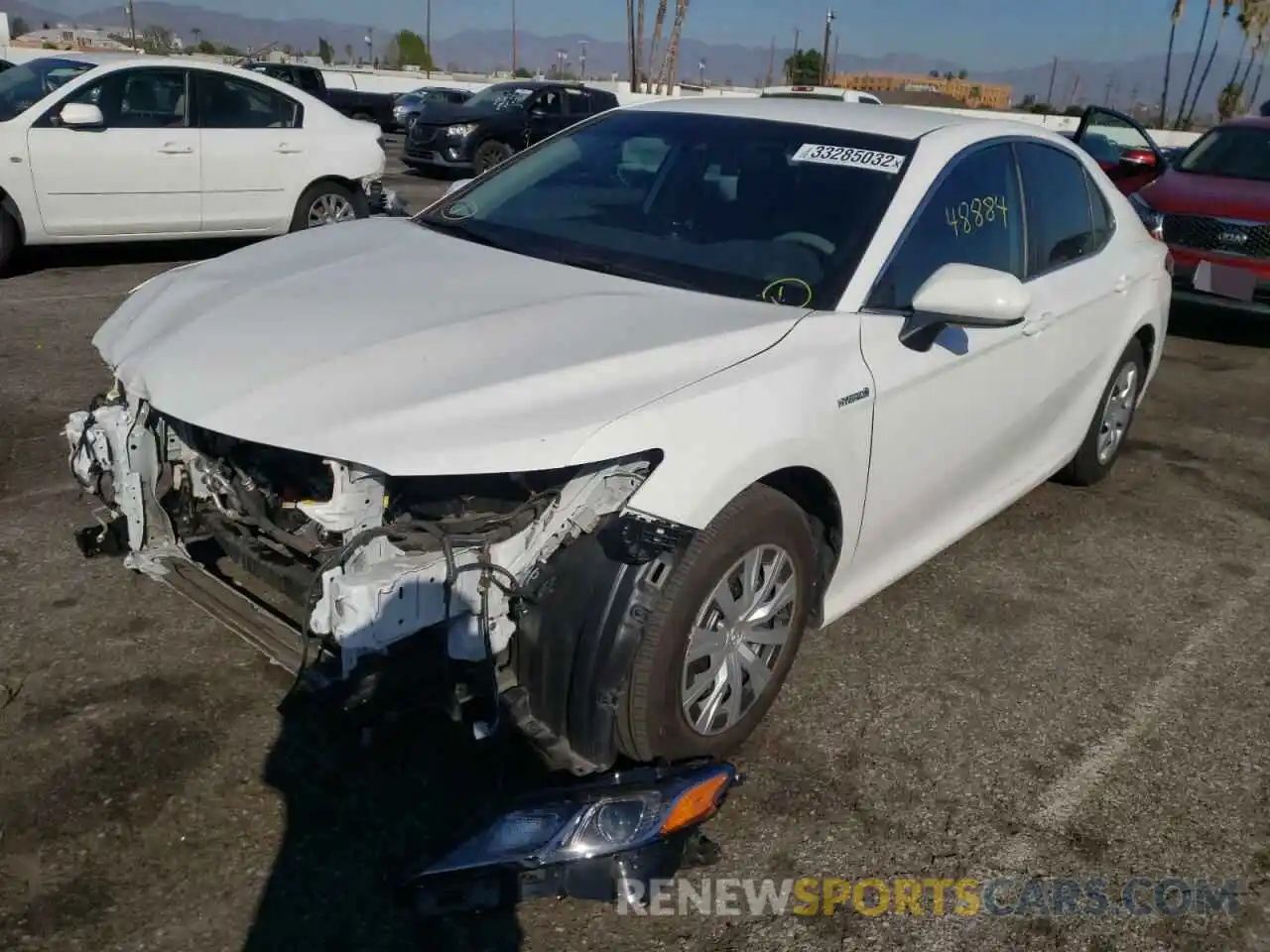 2 Photograph of a damaged car 4T1B31HK0KU513980 TOYOTA CAMRY 2019