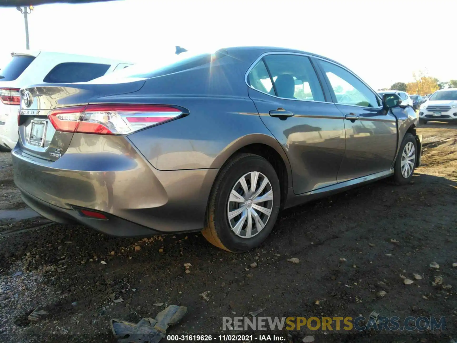 4 Photograph of a damaged car 4T1B31HK0KU514207 TOYOTA CAMRY 2019