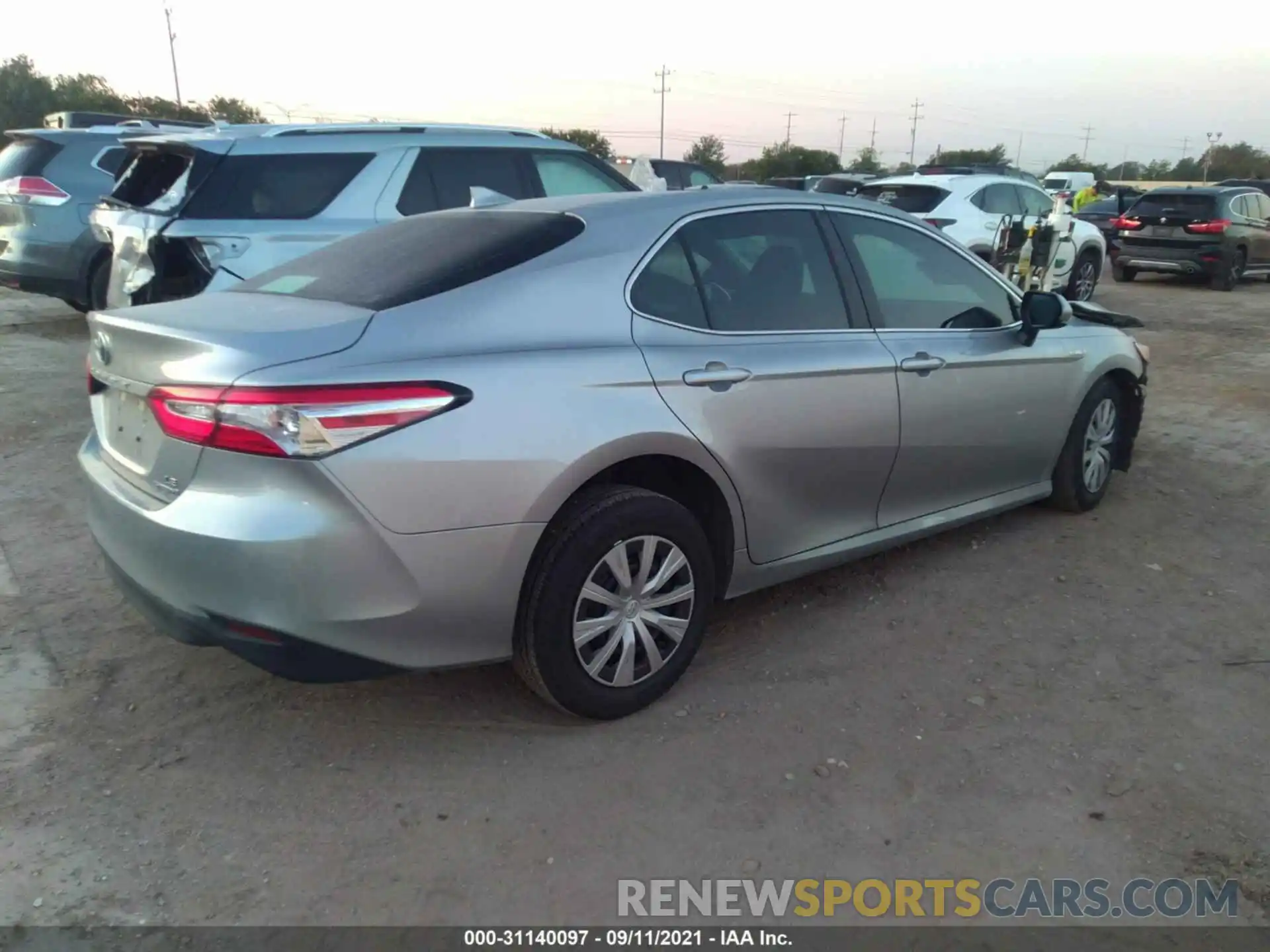 4 Photograph of a damaged car 4T1B31HK0KU517723 TOYOTA CAMRY 2019