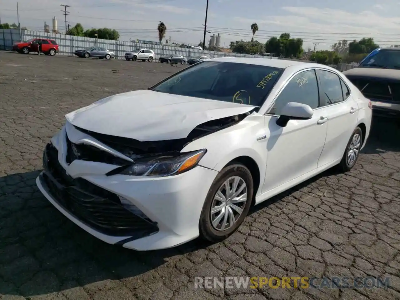 2 Photograph of a damaged car 4T1B31HK1KU005047 TOYOTA CAMRY 2019