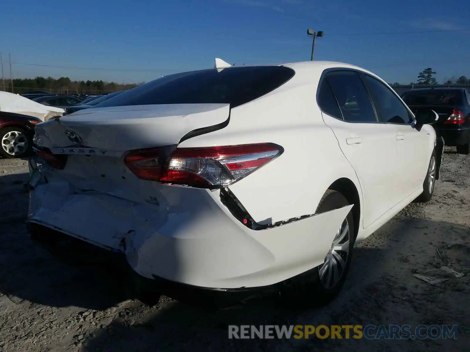 4 Photograph of a damaged car 4T1B31HK1KU007798 TOYOTA CAMRY 2019