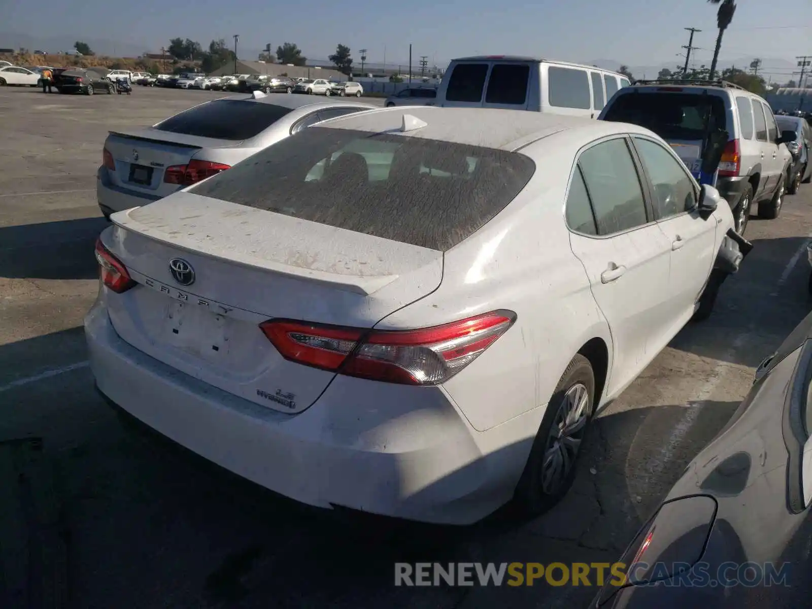 4 Photograph of a damaged car 4T1B31HK1KU513339 TOYOTA CAMRY 2019