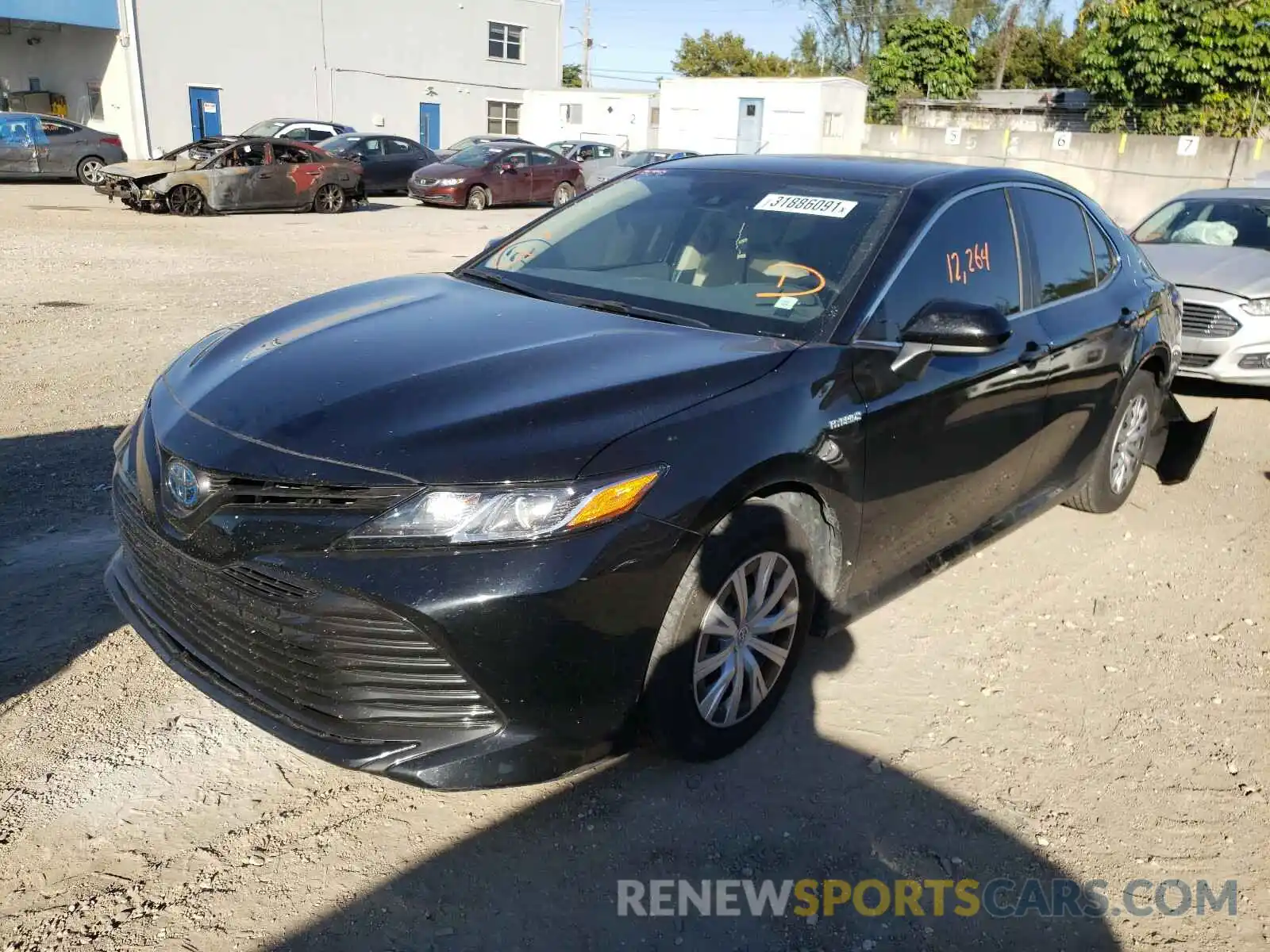 2 Photograph of a damaged car 4T1B31HK1KU517245 TOYOTA CAMRY 2019