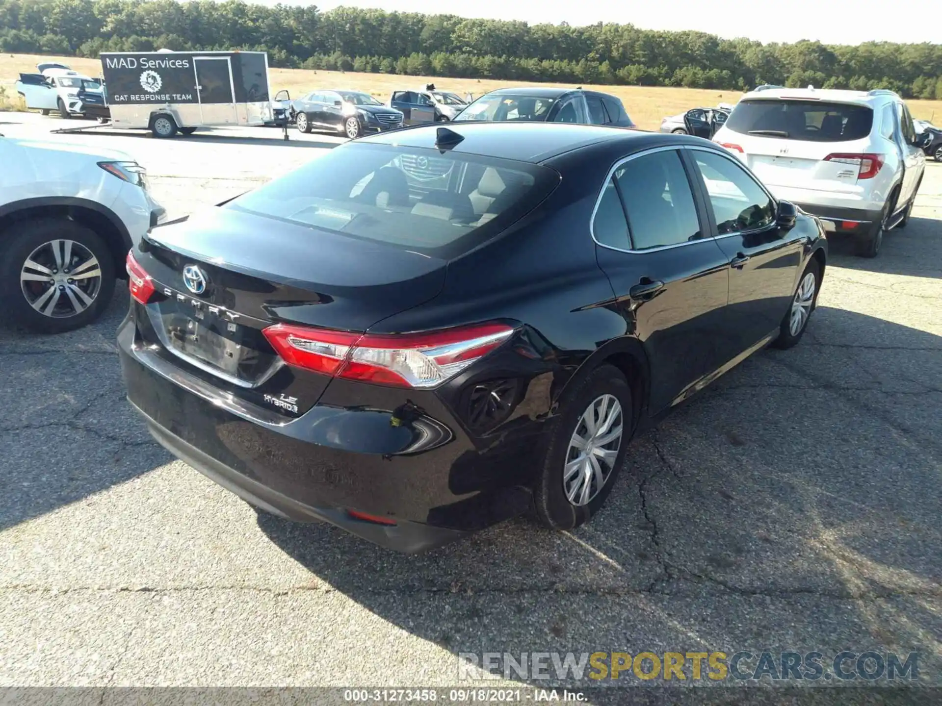 4 Photograph of a damaged car 4T1B31HK4KU516171 TOYOTA CAMRY 2019