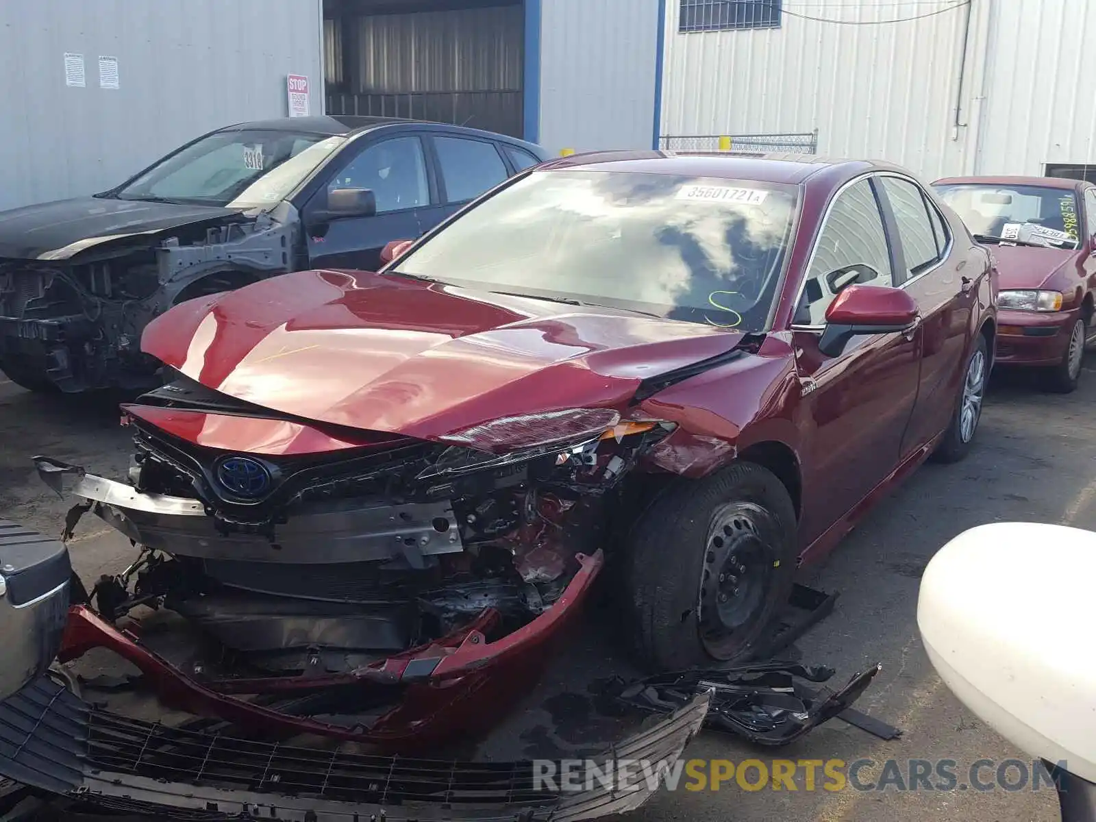 2 Photograph of a damaged car 4T1B31HK7KU511563 TOYOTA CAMRY 2019