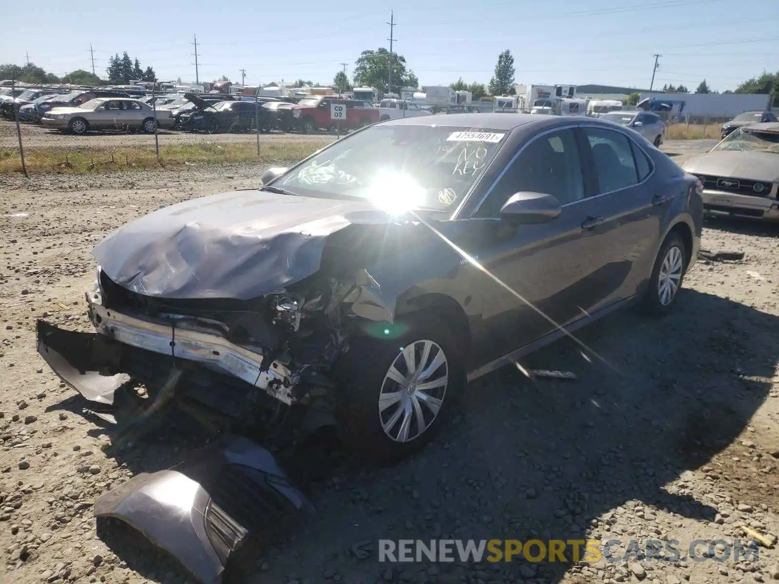 2 Photograph of a damaged car 4T1B31HK7KU516715 TOYOTA CAMRY 2019