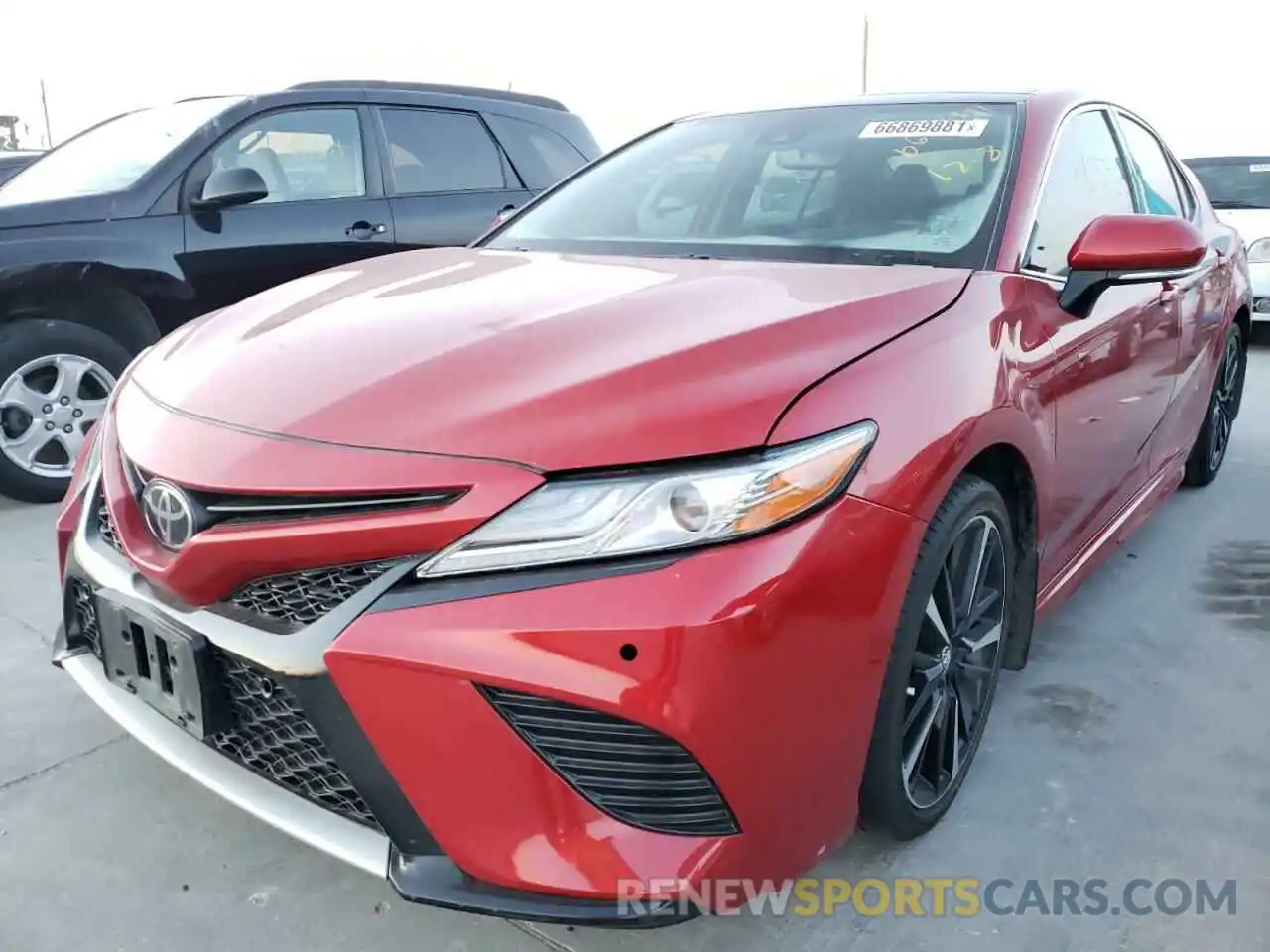 2 Photograph of a damaged car 4T1B61HK0KU165038 TOYOTA CAMRY 2019