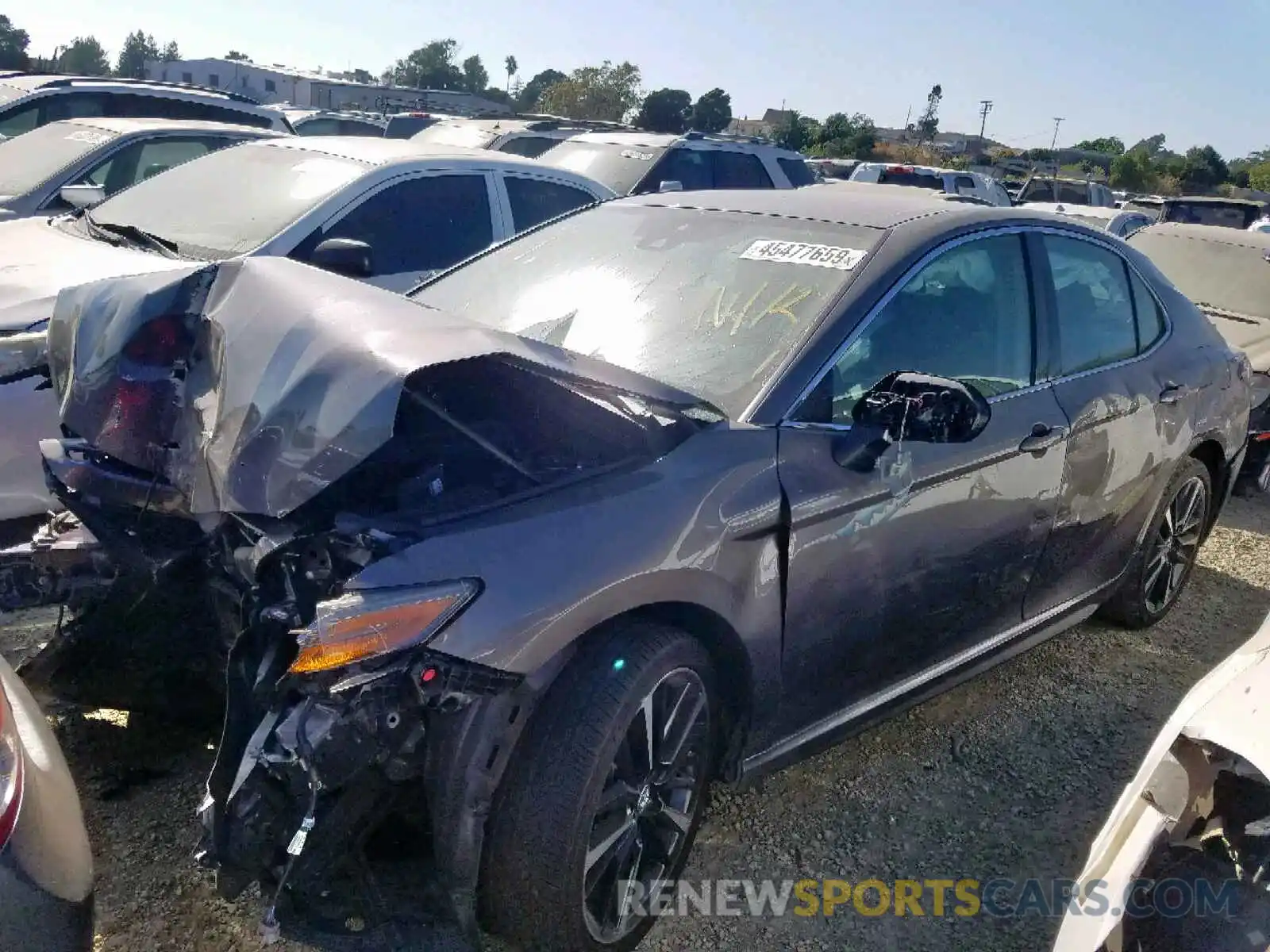 2 Photograph of a damaged car 4T1B61HK0KU166514 TOYOTA CAMRY 2019