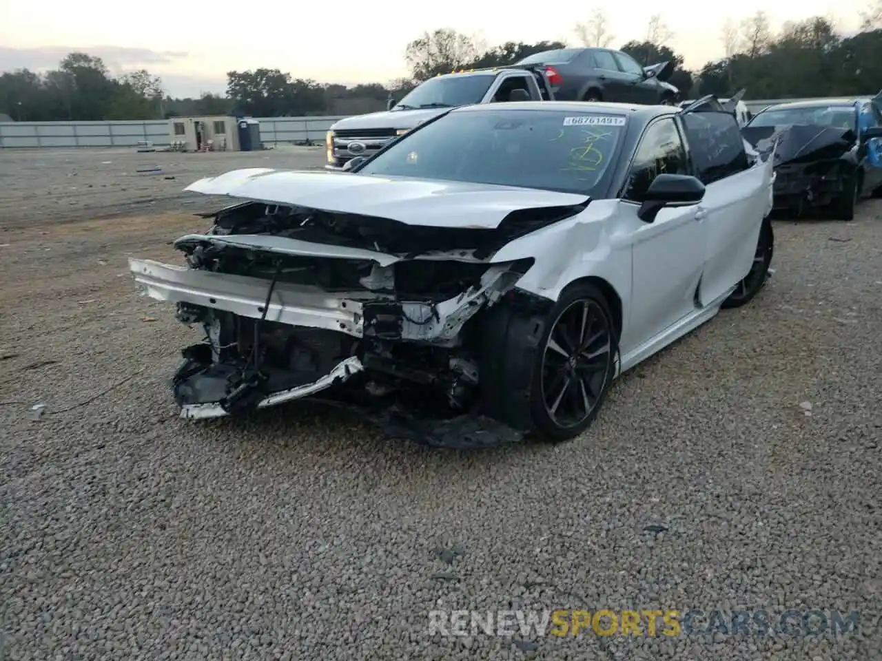 2 Photograph of a damaged car 4T1B61HK0KU171714 TOYOTA CAMRY 2019