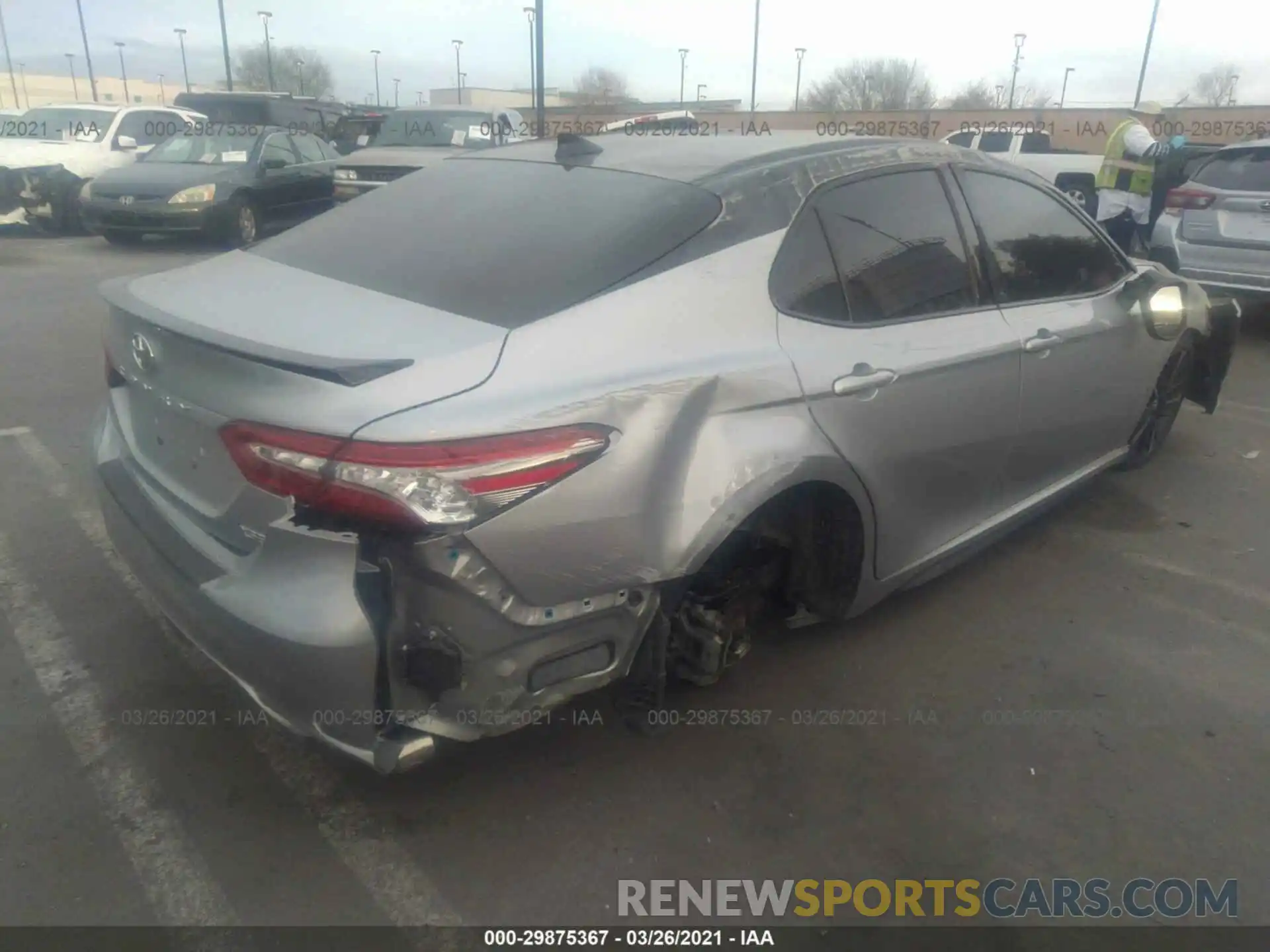 4 Photograph of a damaged car 4T1B61HK0KU198430 TOYOTA CAMRY 2019