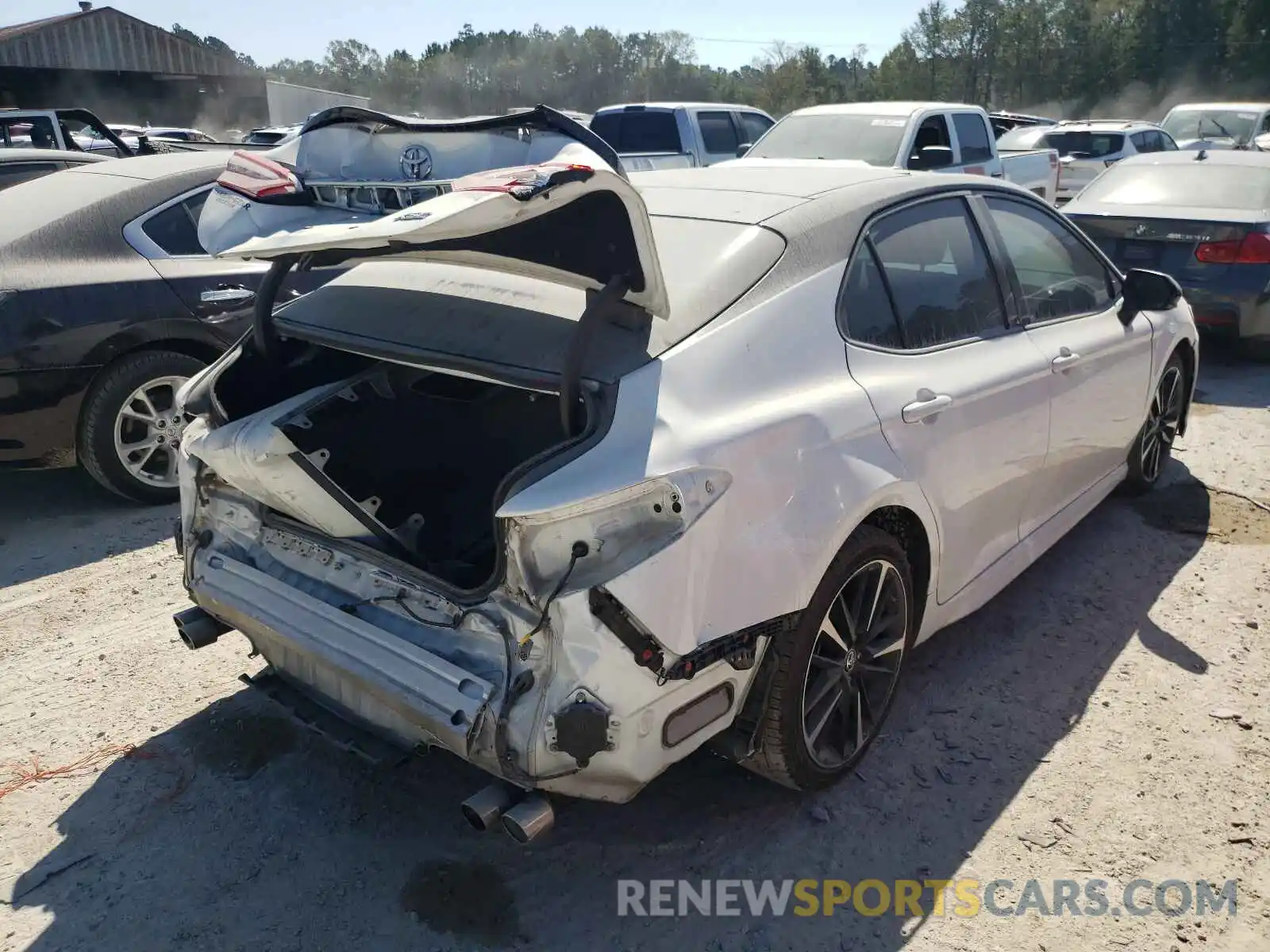 4 Photograph of a damaged car 4T1B61HK0KU199030 TOYOTA CAMRY 2019