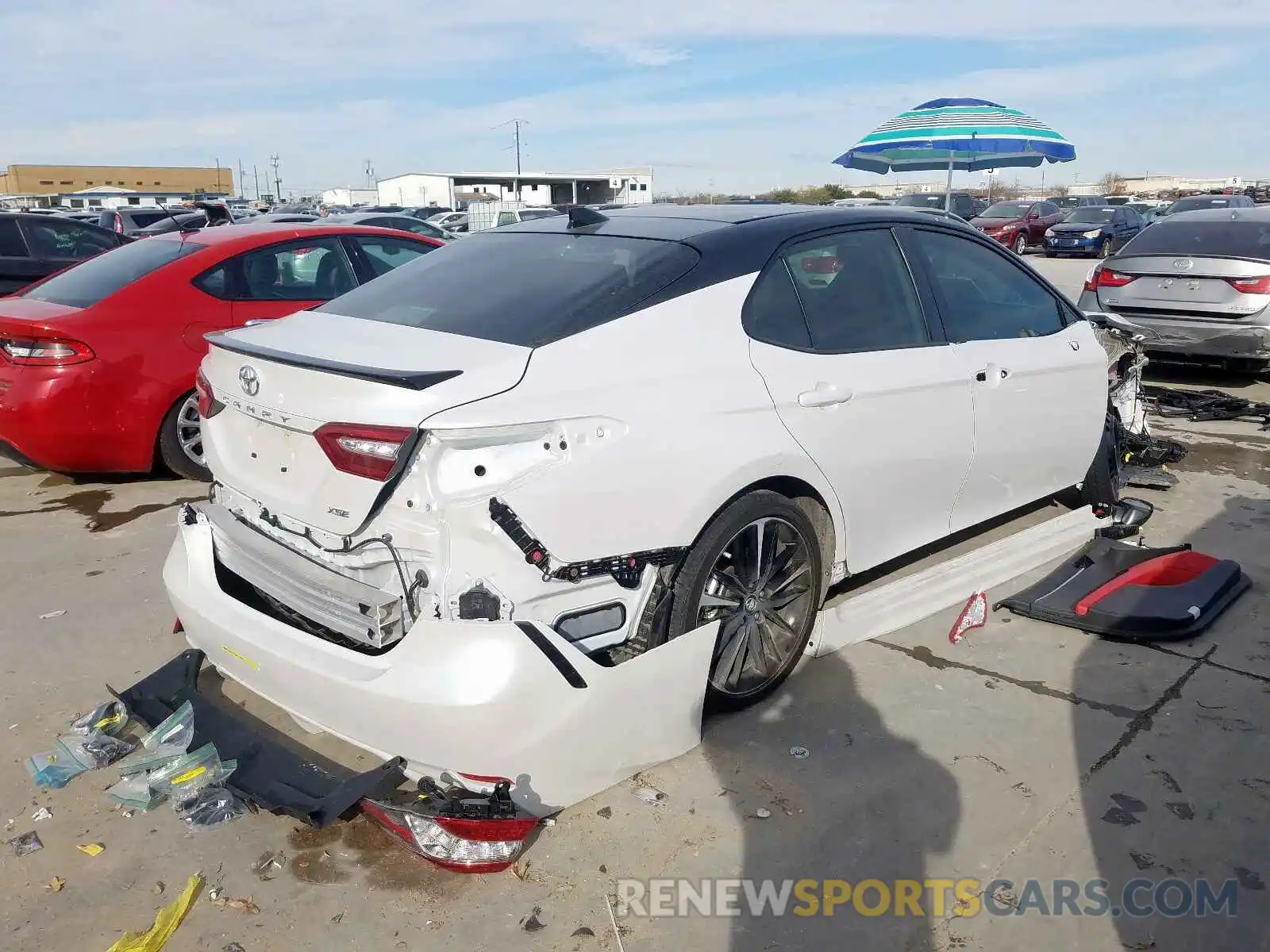 4 Photograph of a damaged car 4T1B61HK0KU204369 TOYOTA CAMRY 2019