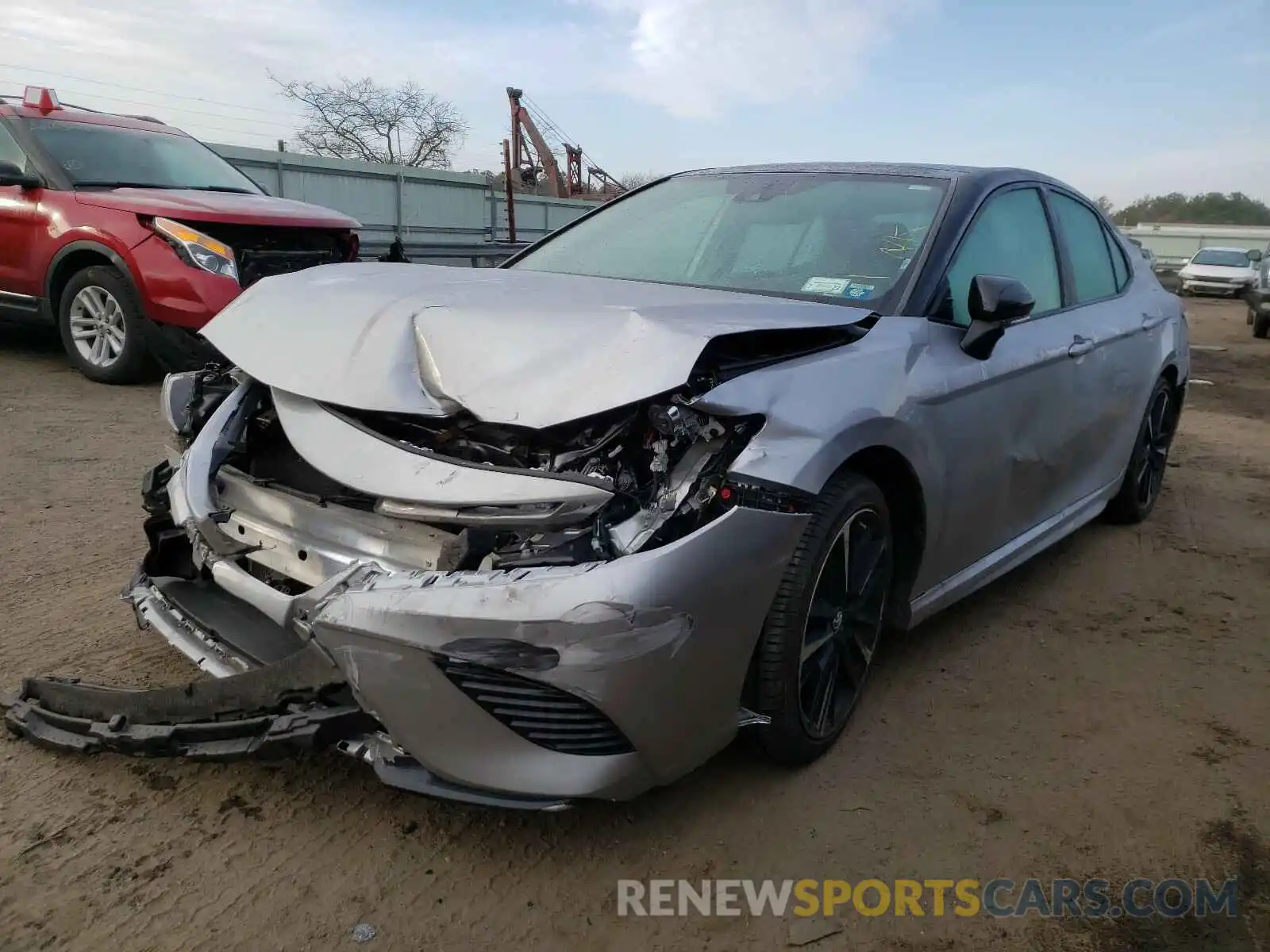 2 Photograph of a damaged car 4T1B61HK0KU211743 TOYOTA CAMRY 2019