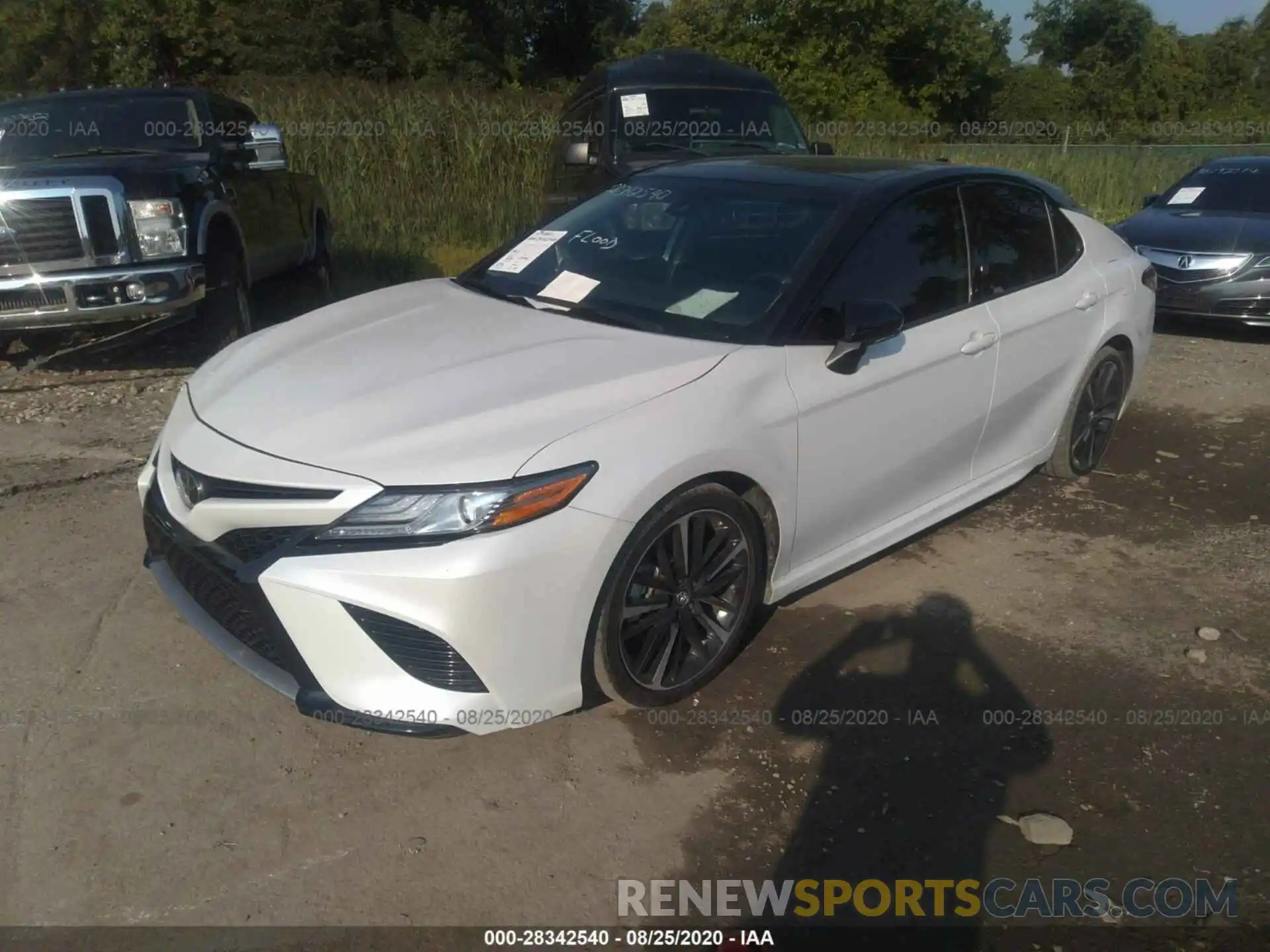 2 Photograph of a damaged car 4T1B61HK0KU217199 TOYOTA CAMRY 2019