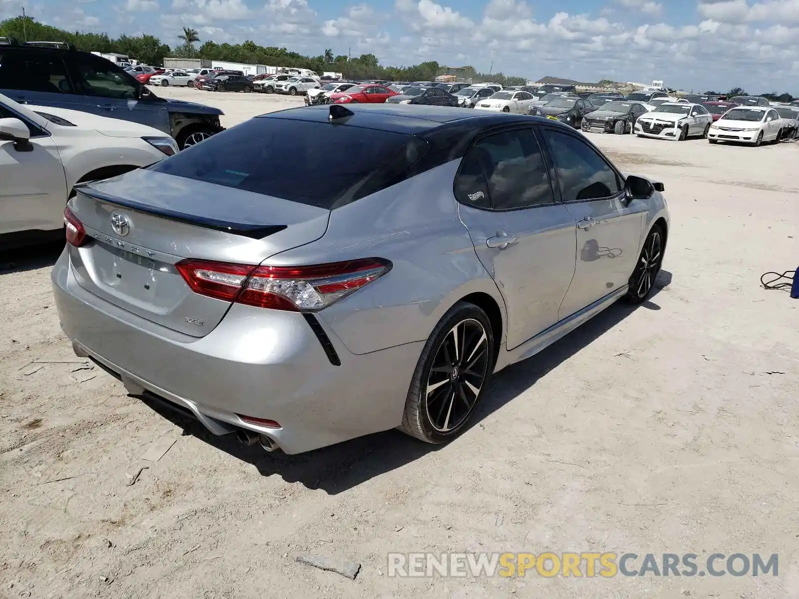 4 Photograph of a damaged car 4T1B61HK0KU218496 TOYOTA CAMRY 2019