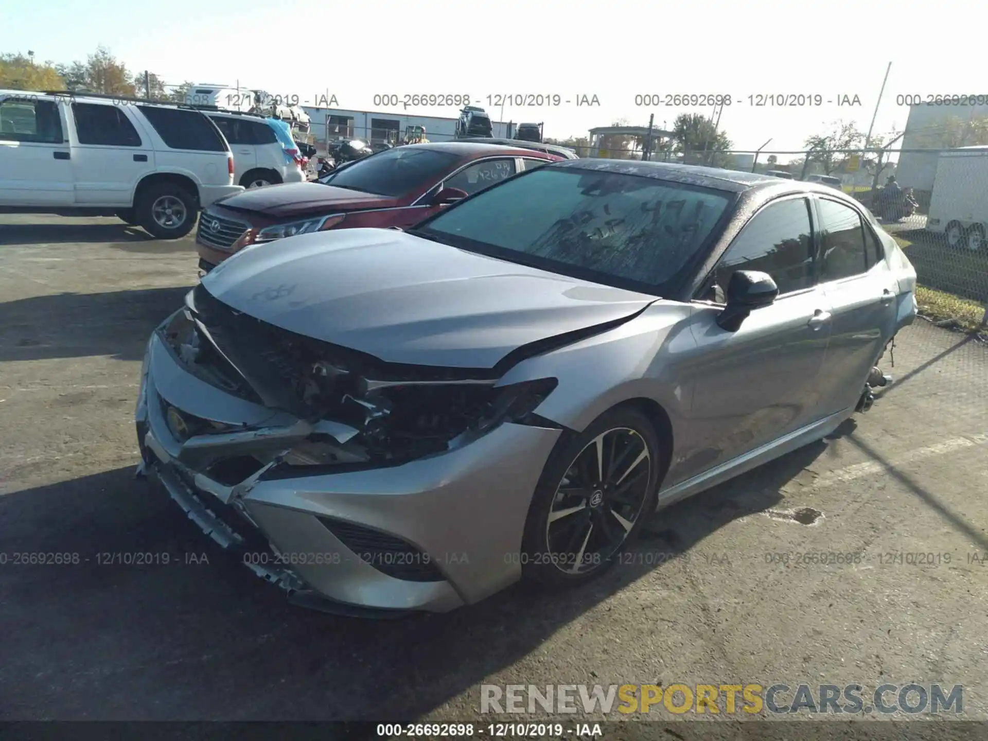 2 Photograph of a damaged car 4T1B61HK0KU253121 TOYOTA CAMRY 2019