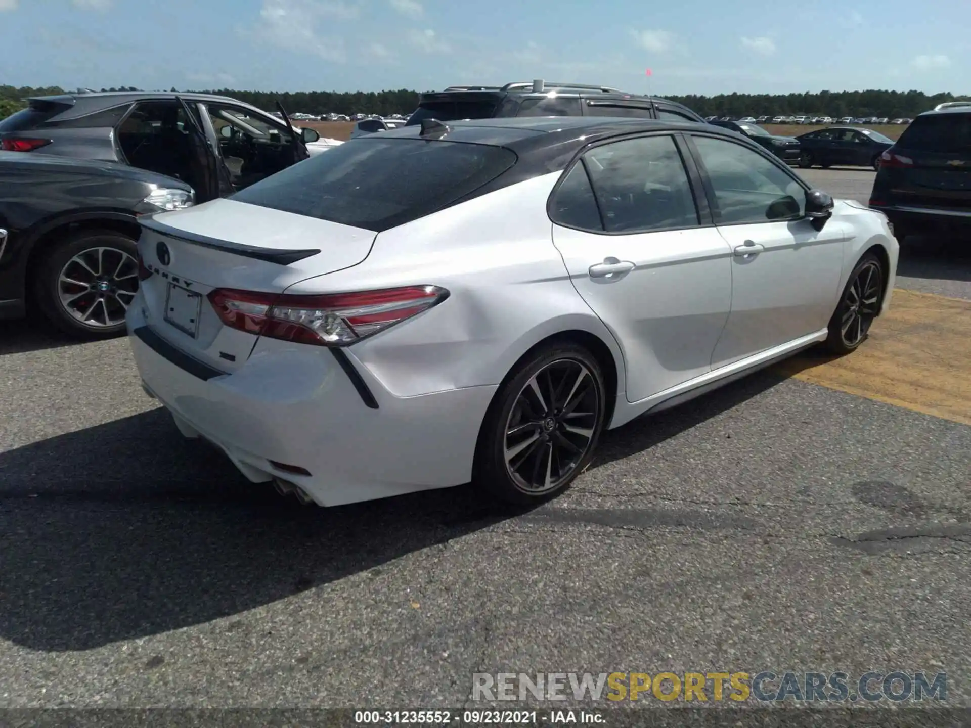 4 Photograph of a damaged car 4T1B61HK0KU278830 TOYOTA CAMRY 2019