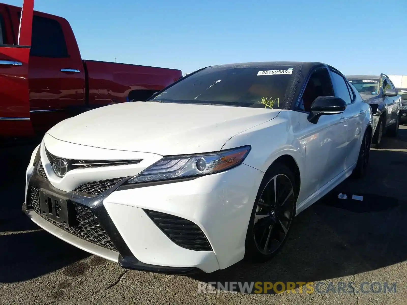 2 Photograph of a damaged car 4T1B61HK0KU284210 TOYOTA CAMRY 2019