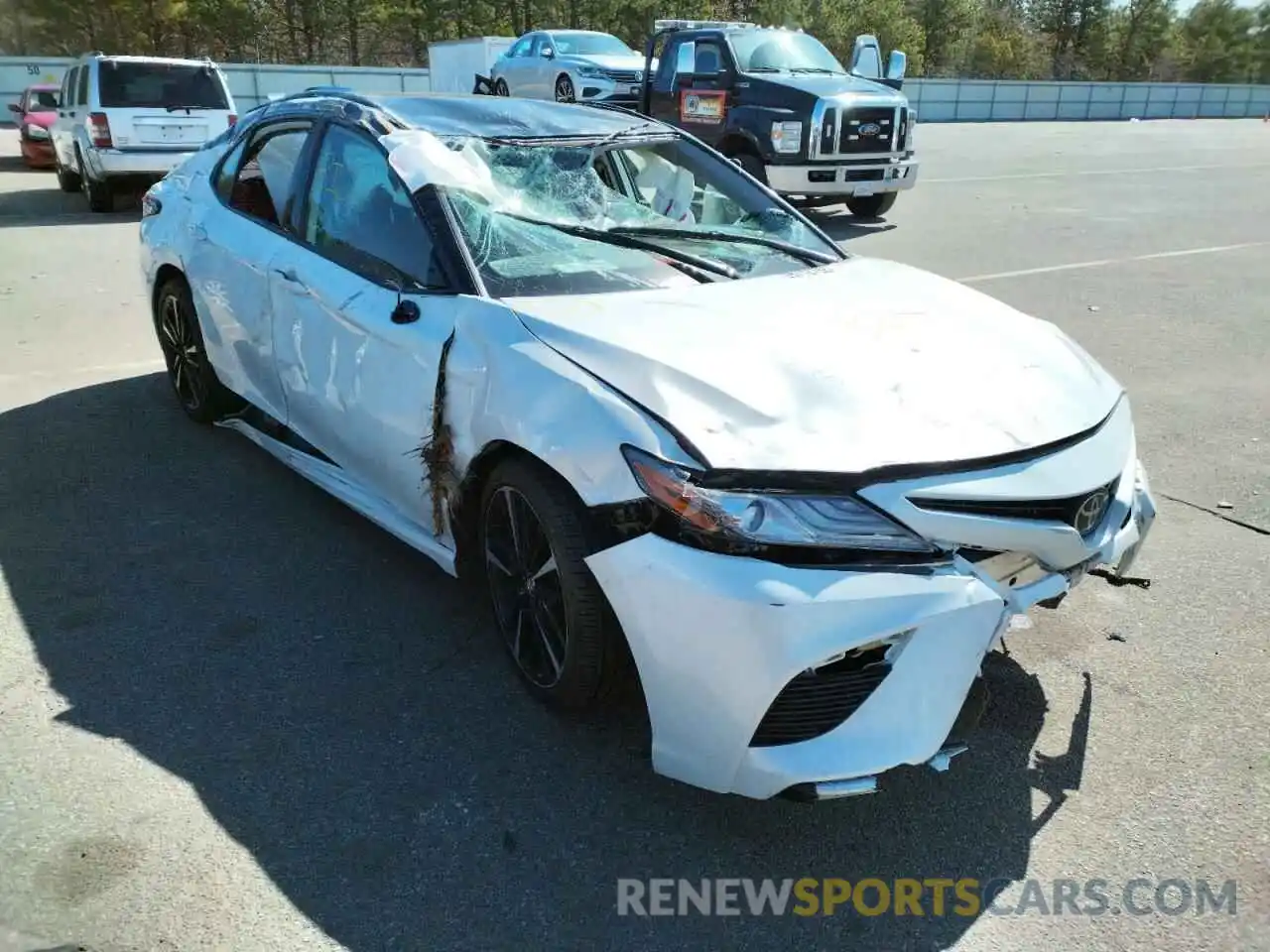 1 Photograph of a damaged car 4T1B61HK0KU292856 TOYOTA CAMRY 2019