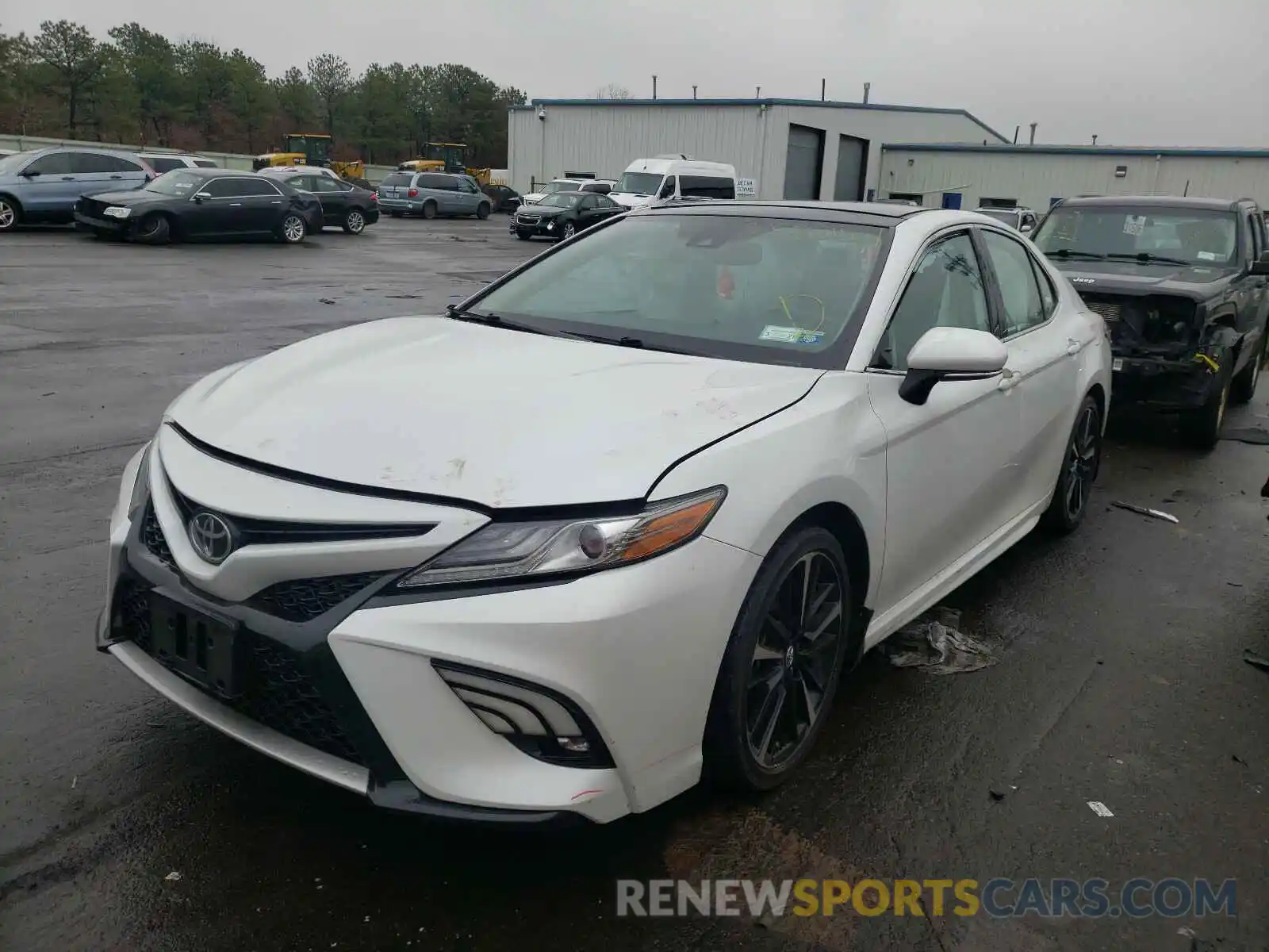 2 Photograph of a damaged car 4T1B61HK0KU701762 TOYOTA CAMRY 2019