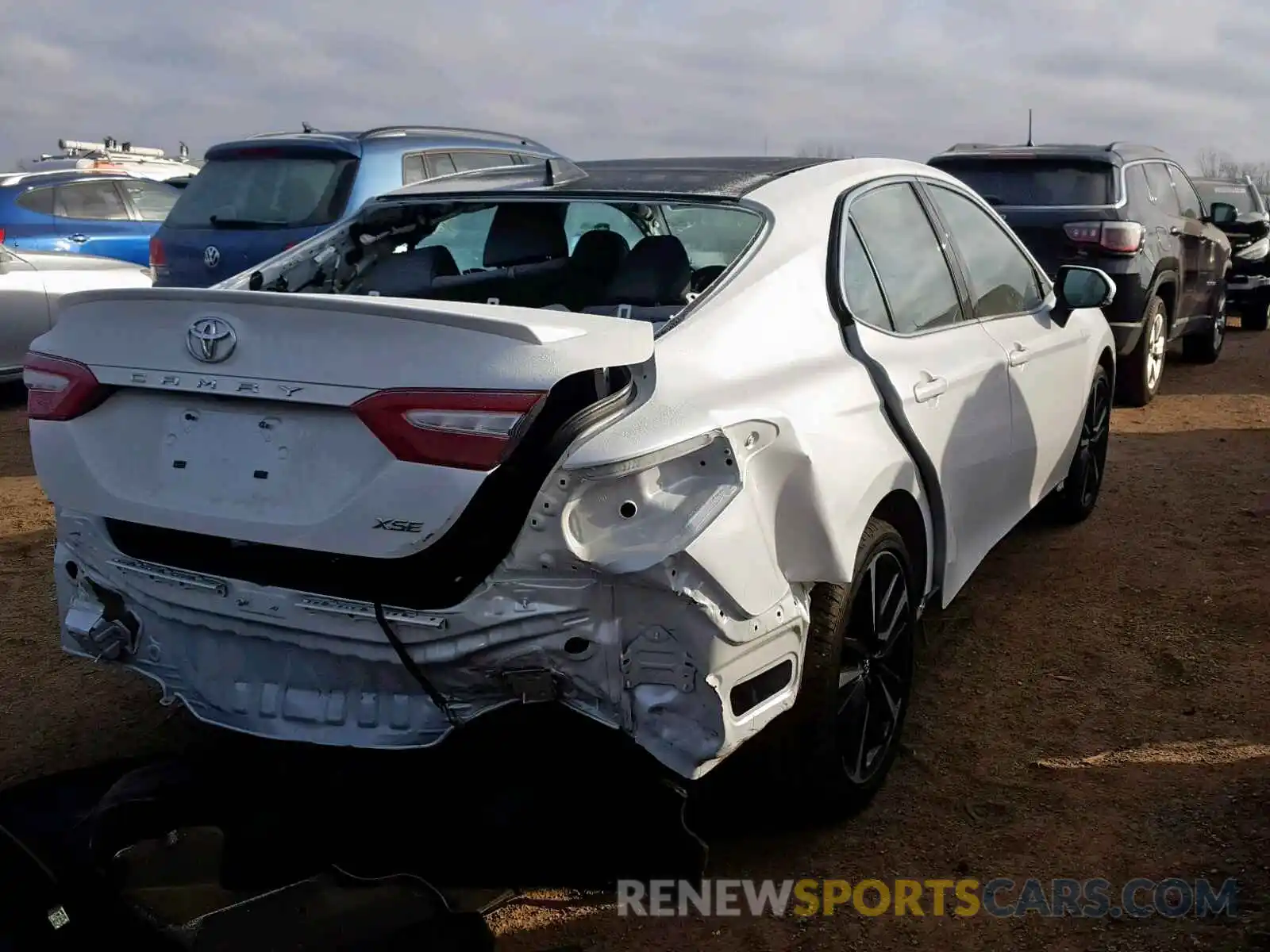 4 Photograph of a damaged car 4T1B61HK0KU705875 TOYOTA CAMRY 2019