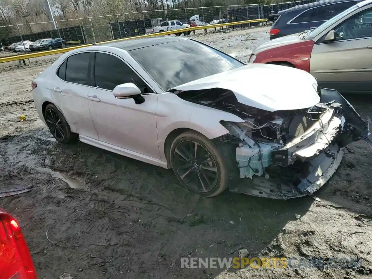 4 Photograph of a damaged car 4T1B61HK0KU710106 TOYOTA CAMRY 2019