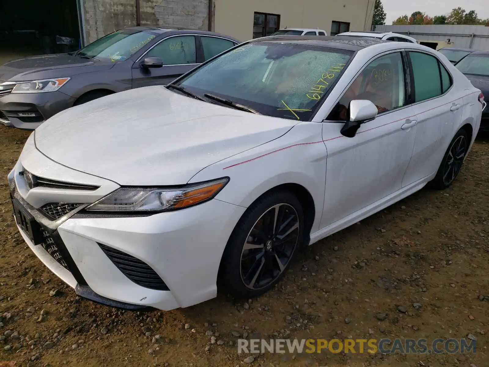 2 Photograph of a damaged car 4T1B61HK0KU710946 TOYOTA CAMRY 2019