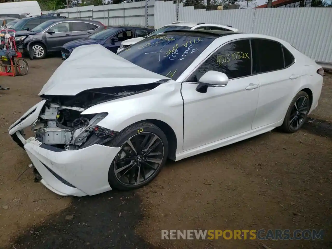 2 Photograph of a damaged car 4T1B61HK0KU712468 TOYOTA CAMRY 2019